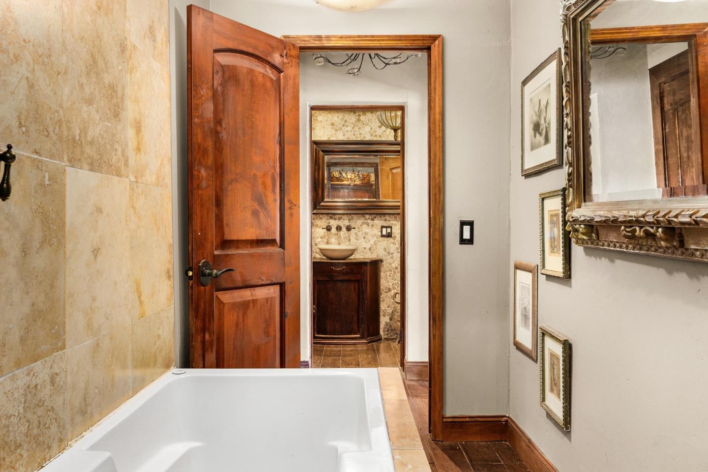 19375 Montevina Road Los Gatos, CA 95033 - Photo 21 of 36 a view of a hallway view with wooden floor and staircase