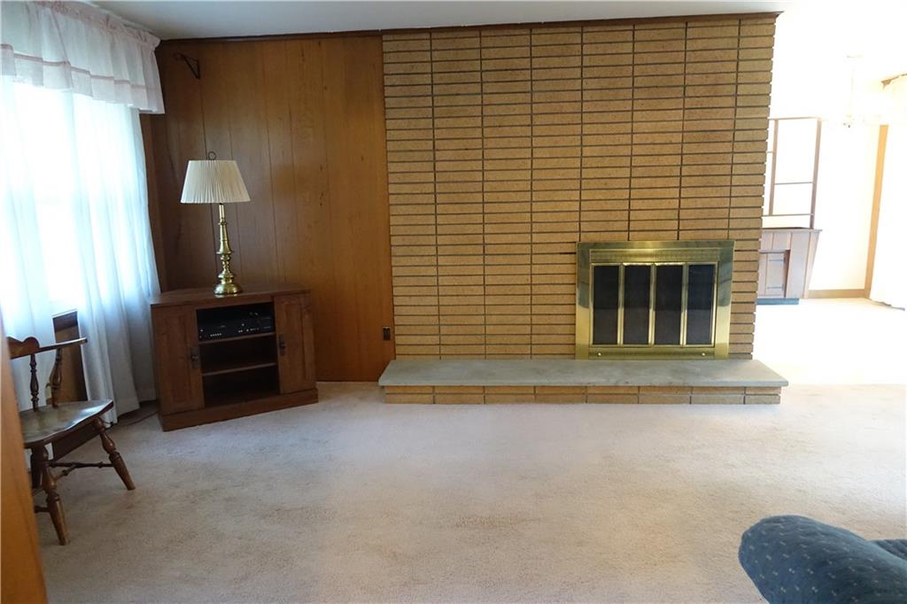 140 Pinehurst Road Butler, PA 16001 - Photo 5 of 25 Spacious Living Room with woodburning Fireplace