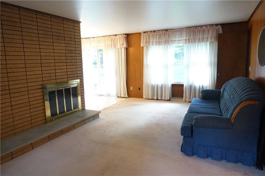 140 Pinehurst Road Butler, PA 16001 - Photo 6 of 25 Spacious Living Room with woodburning Fireplace