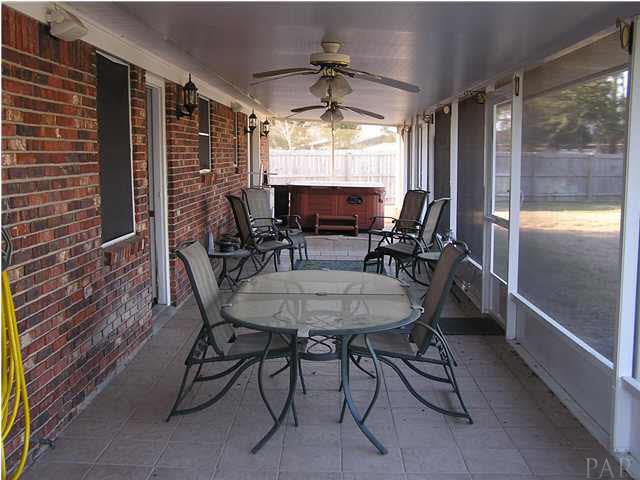 356 Quigley Road Pensacola, FL 32506 - Photo 5 of 15 Tiled 43x10 screened patio.