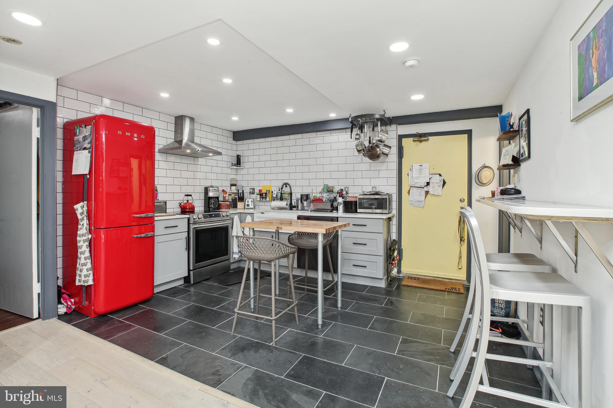 1855 Calvert Street Northwest, Unit LL2 Washington, DC 20009 - Photo 11 of 21 Chef's Kit. w/quartz counters & sleek appliances