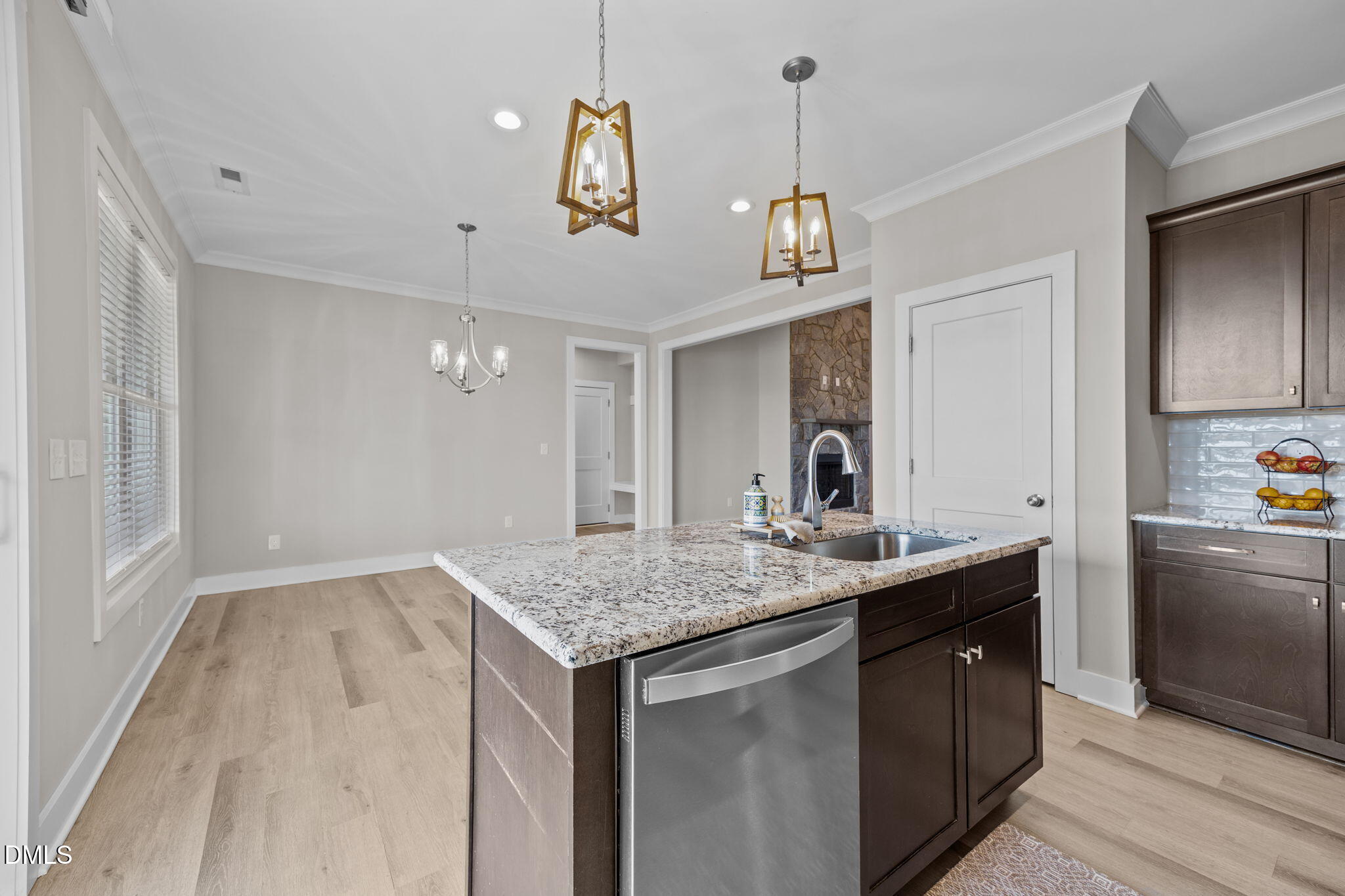 363 Mulberry Road Spring Hope, NC 27882 - Photo 14 of 35 a kitchen with a sink chandelier and refrigerator
