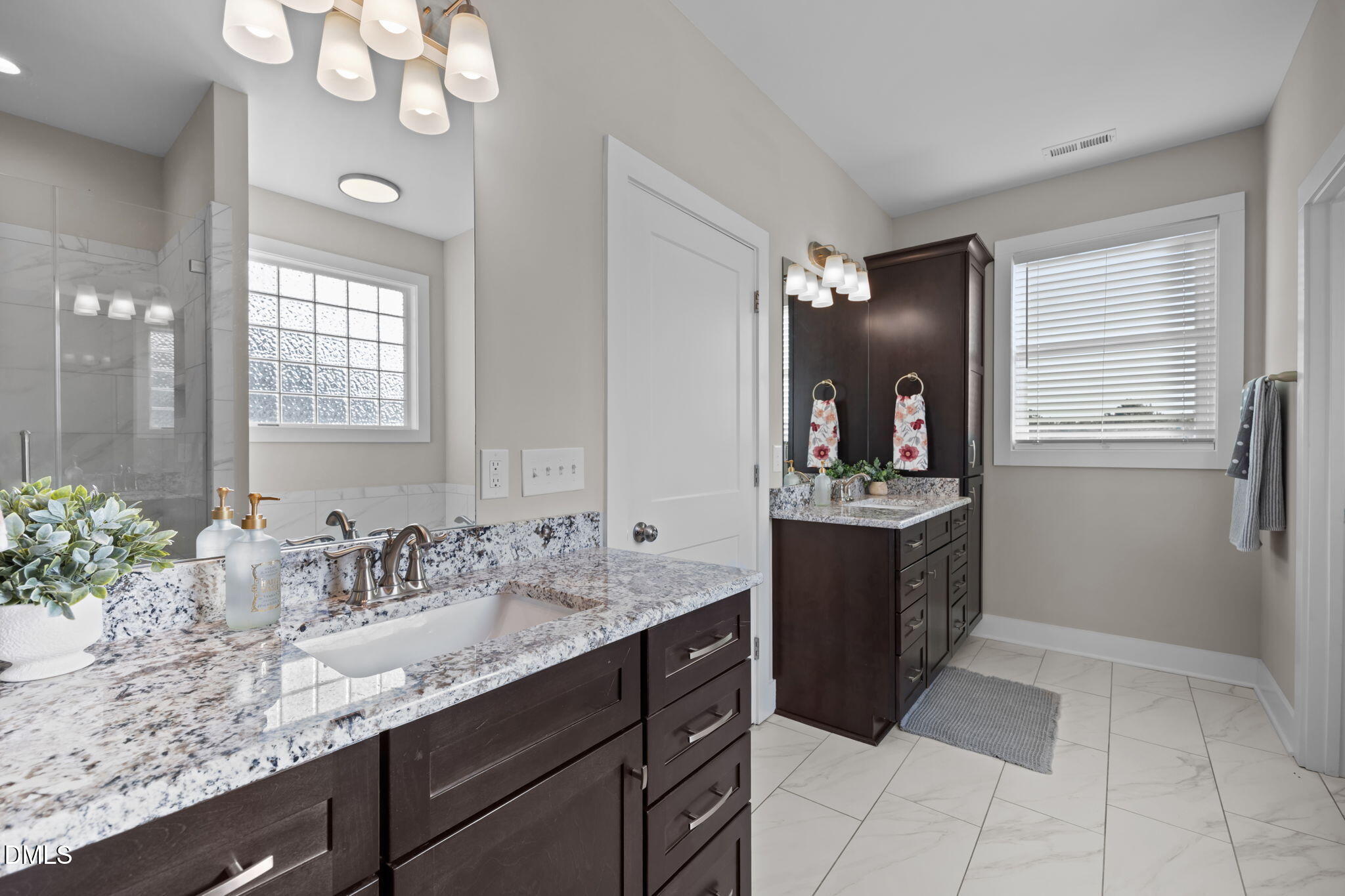 363 Mulberry Road Spring Hope, NC 27882 - Photo 22 of 32 a bathroom with a granite countertop sink a mirror and a bathtub