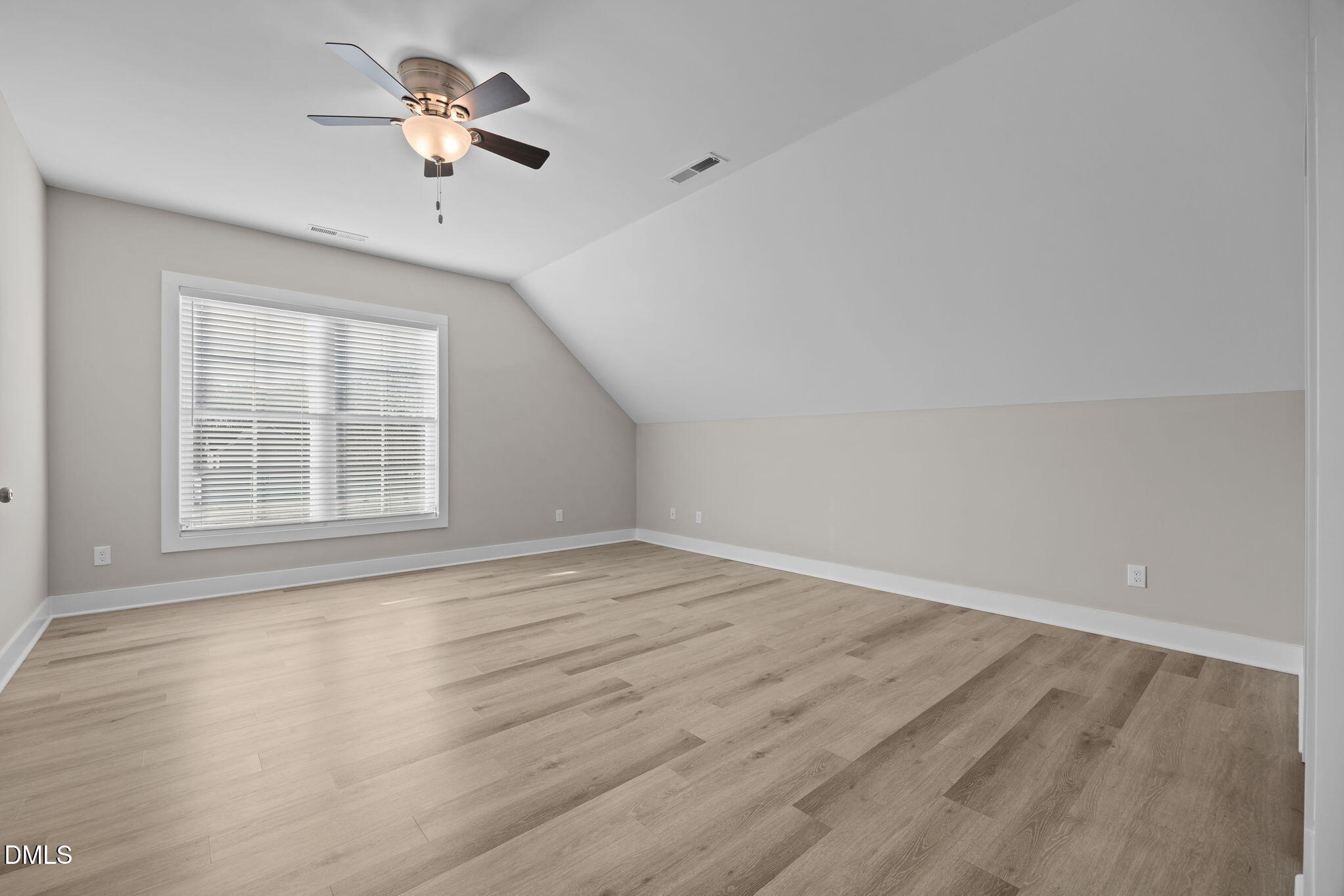 363 Mulberry Road Spring Hope, NC 27882 - Photo 29 of 35 wooden floor in an empty room with a window