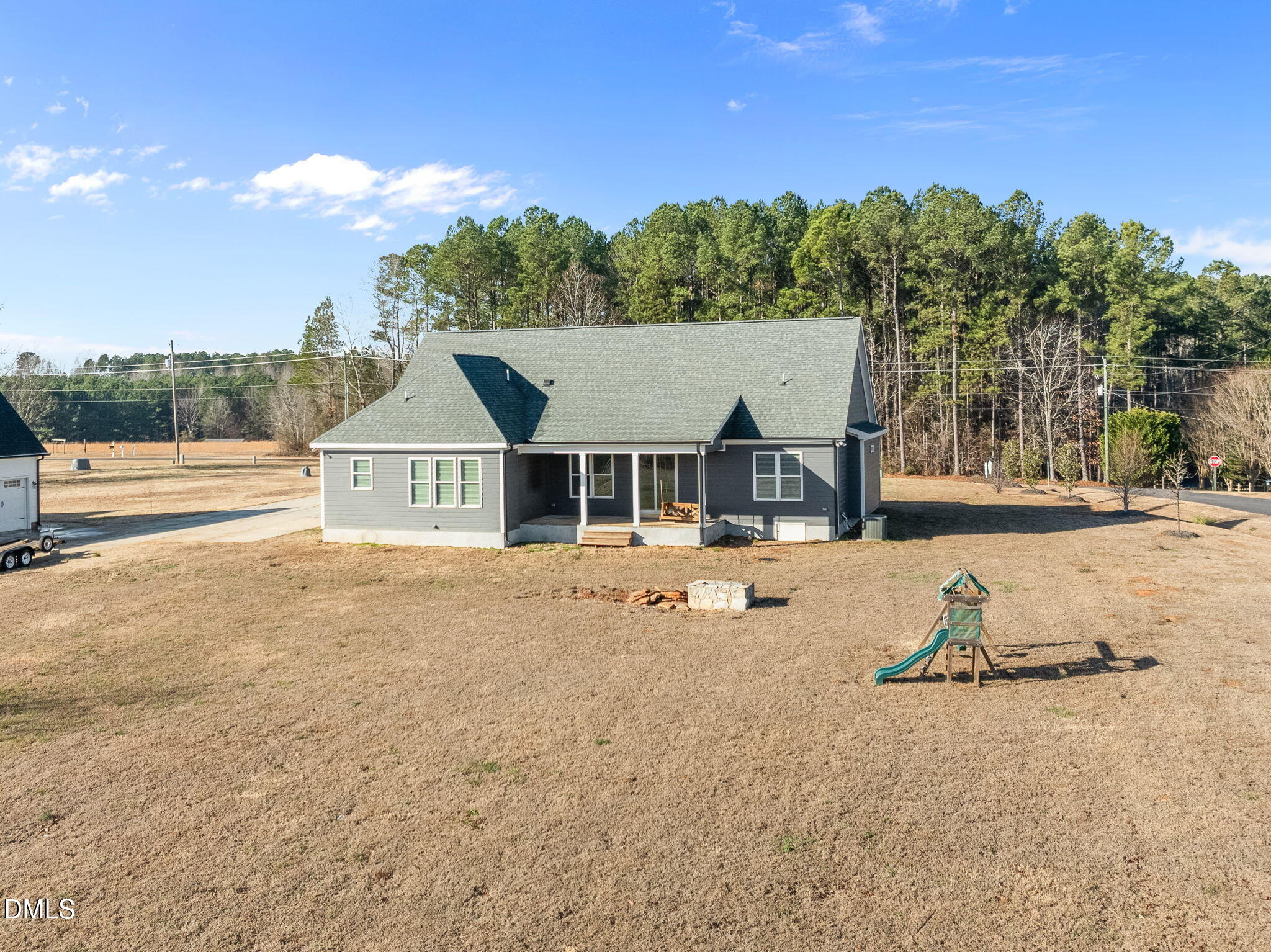 363 Mulberry Road Spring Hope, NC 27882 - Photo 34 of 35 a view of a house with a yard