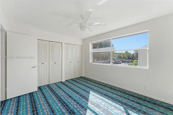 a bathroom with a sink a toilet and bathtub