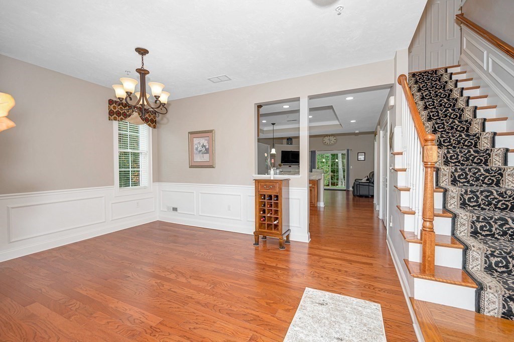 53 Baldwin Road, Unit 1701 Billerica, MA 01821 - Photo 4 of 42 wooden floor in an empty room