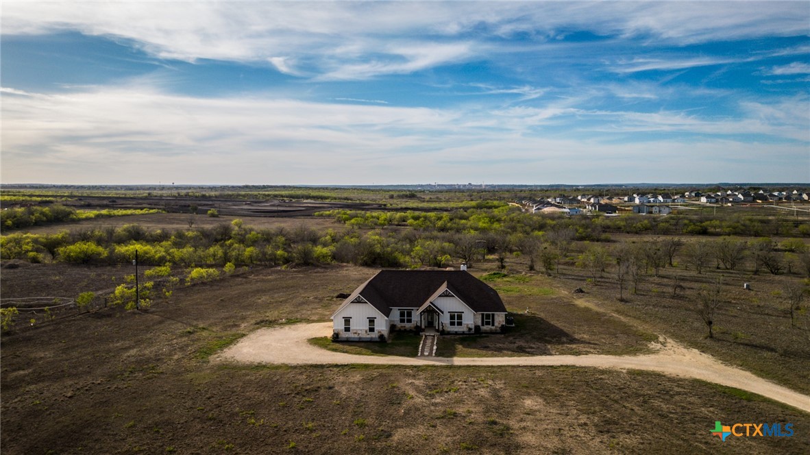 1642 Scull Road San Marcos, TX 78666 - Photo 29 of 31 Drone view showcasing the full 10-acre property, providing a clear perspective of its size and setting.