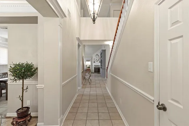 a view of a hallway view with staircase