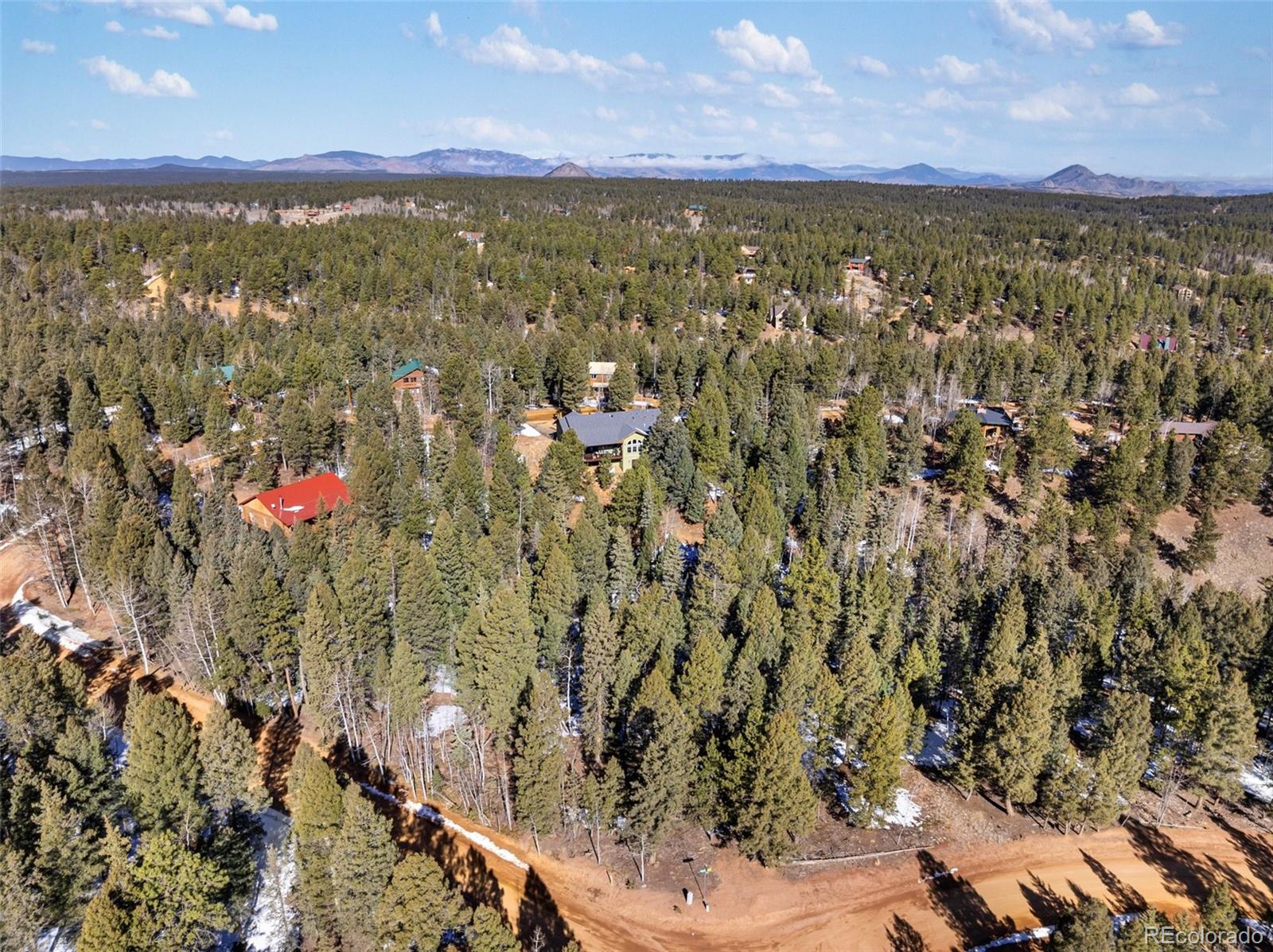 810 Ridge Road Divide, CO 80814 - Photo 3 of 14 a view of city and swimming pool