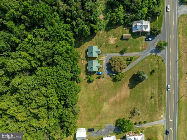 an aerial view of residential house with outdoor space