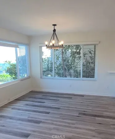 an empty room that has a window