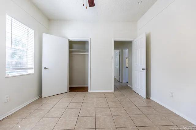 a view of an empty room with window