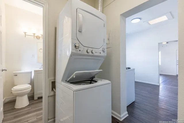 a view of bathroom with a toilet and a sink
