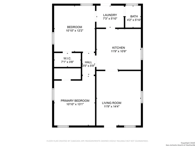 a picture of a bench in front of a wall