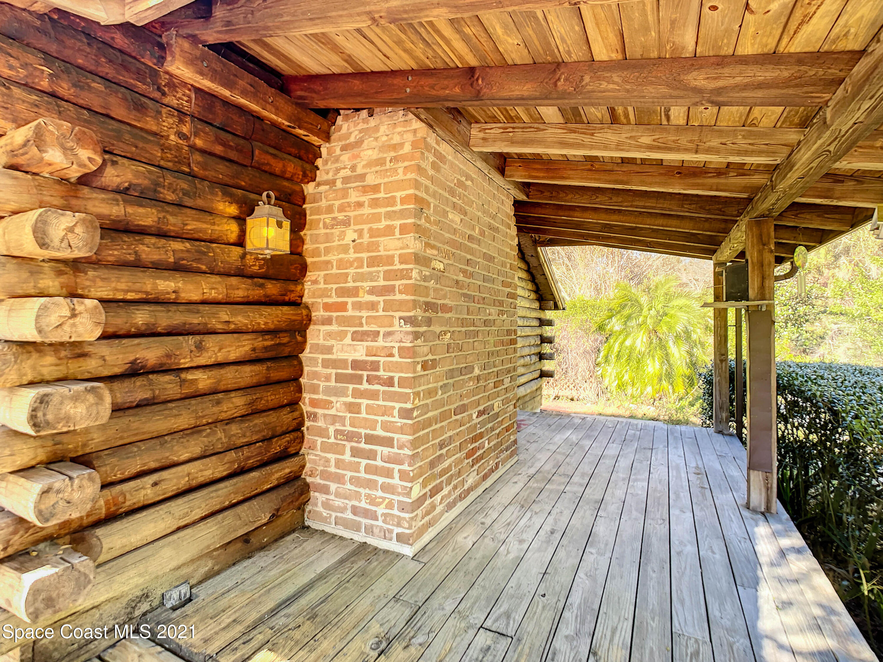 4340 Burkholm Road Mims, FL 32754 - Photo 11 of 39 Side Porch