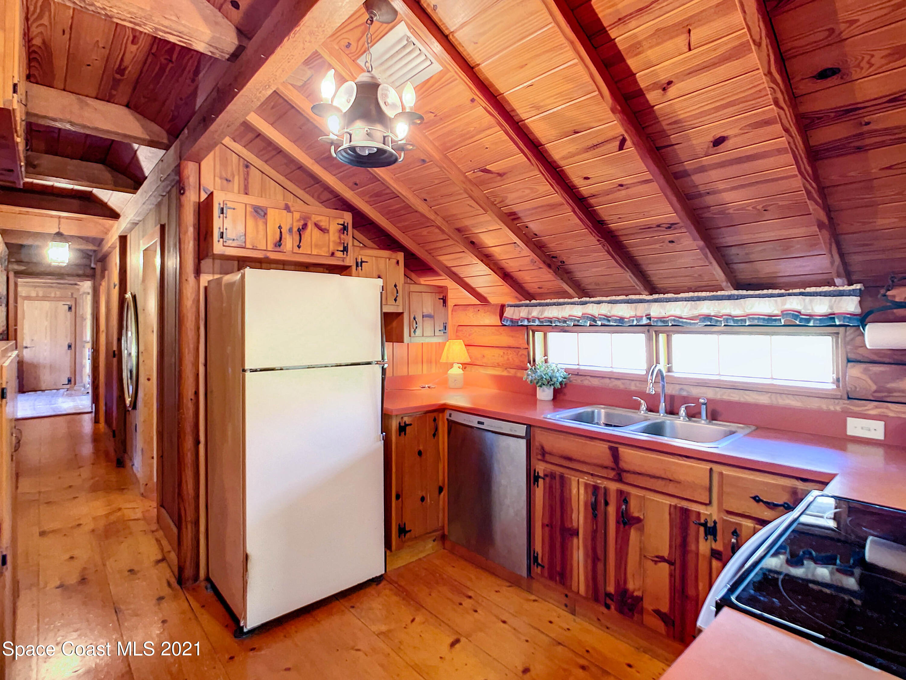 4340 Burkholm Road Mims, FL 32754 - Photo 15 of 39 Kitchen Towards Hall and Bedrooms