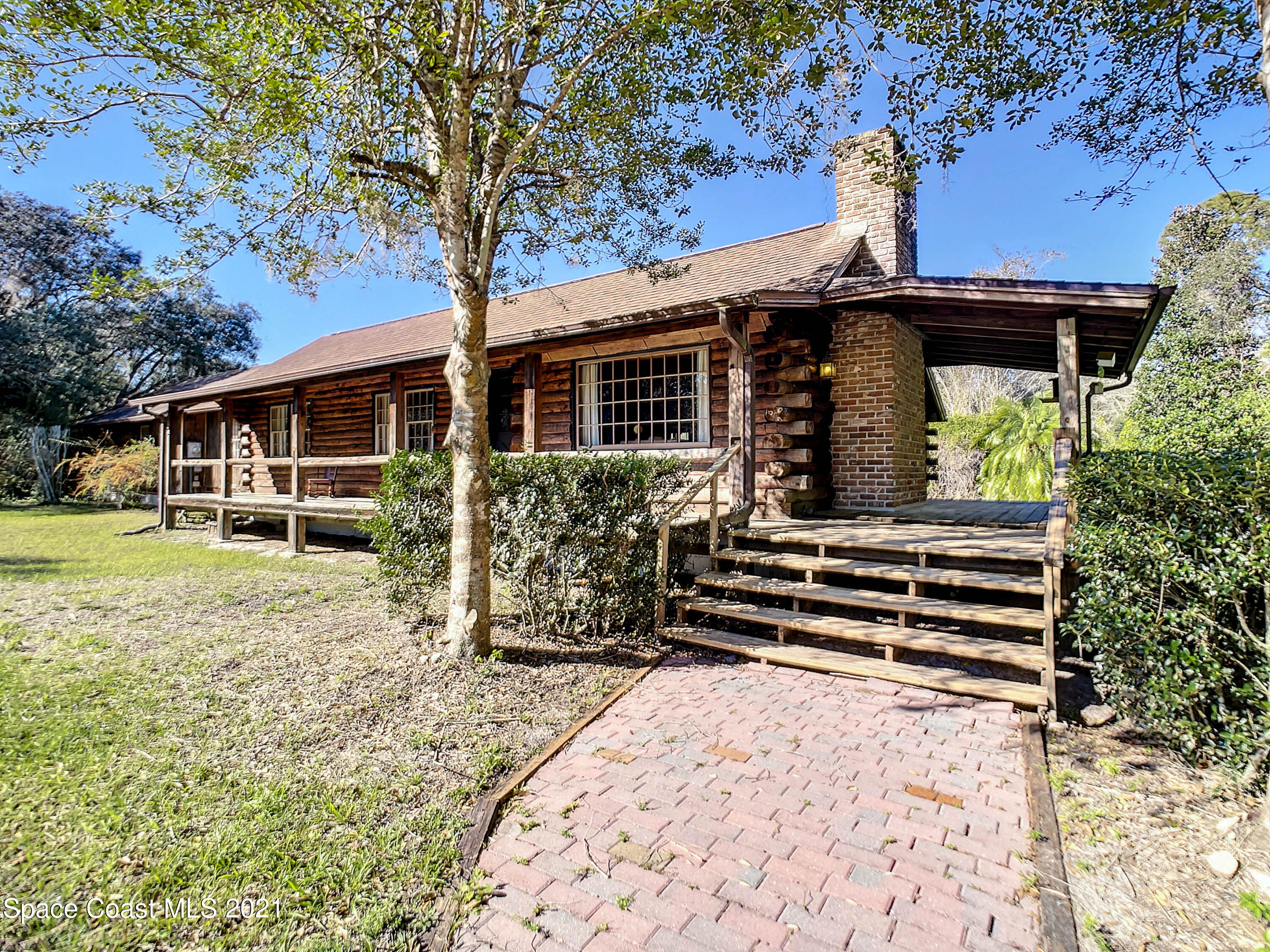 4340 Burkholm Road Mims, FL 32754 - Photo 2 of 39 Log Cabin!