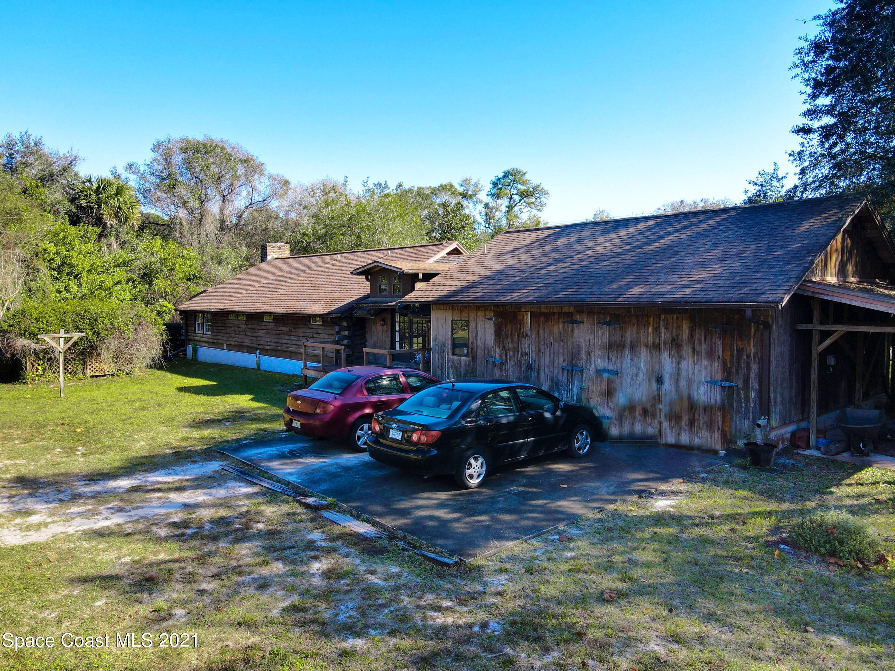 4340 Burkholm Road Mims, FL 32754 - Photo 32 of 39 2-Car Garage + Carport
