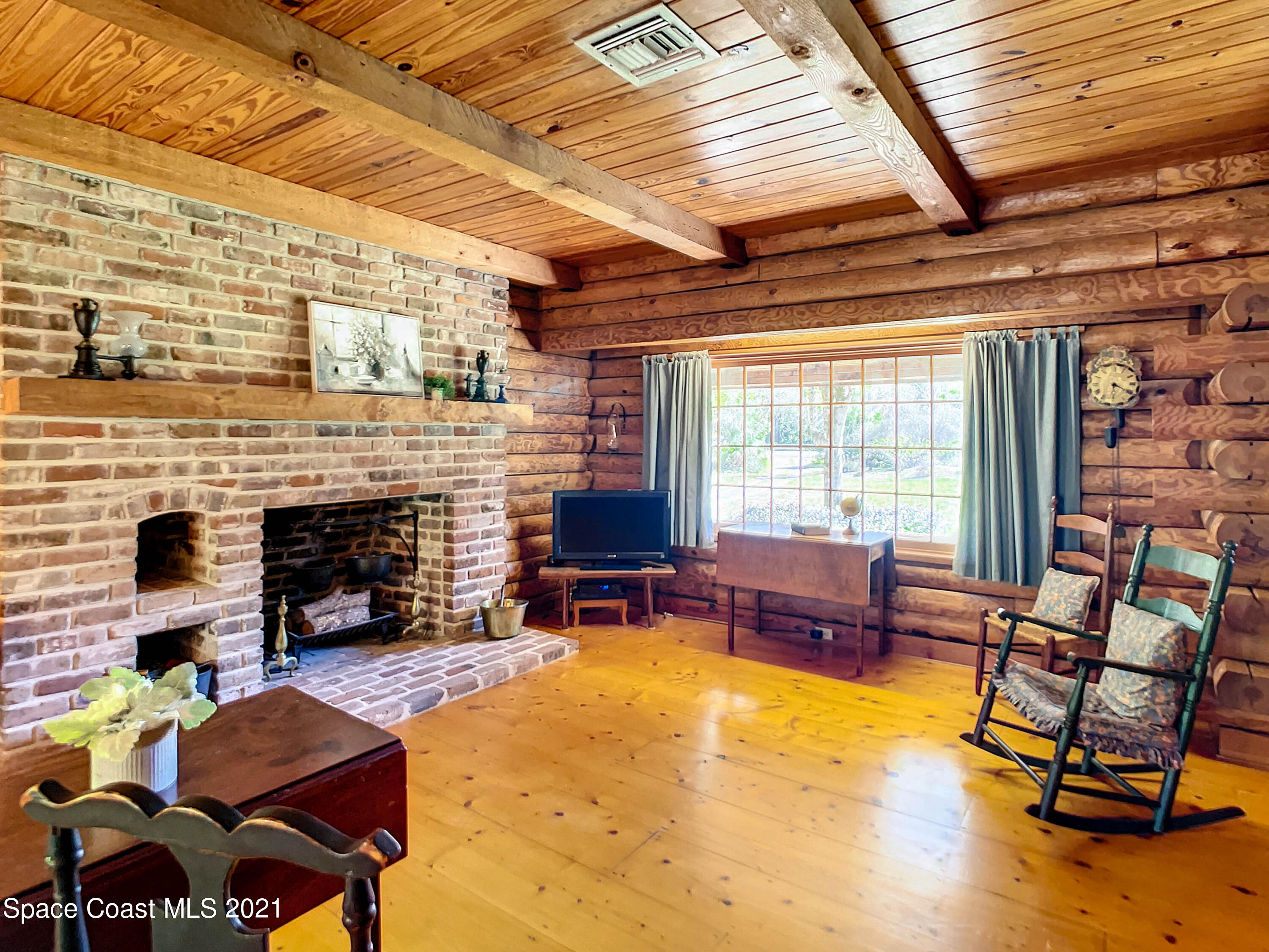 4340 Burkholm Road Mims, FL 32754 - Photo 7 of 39 Living Room Hardwood Floors