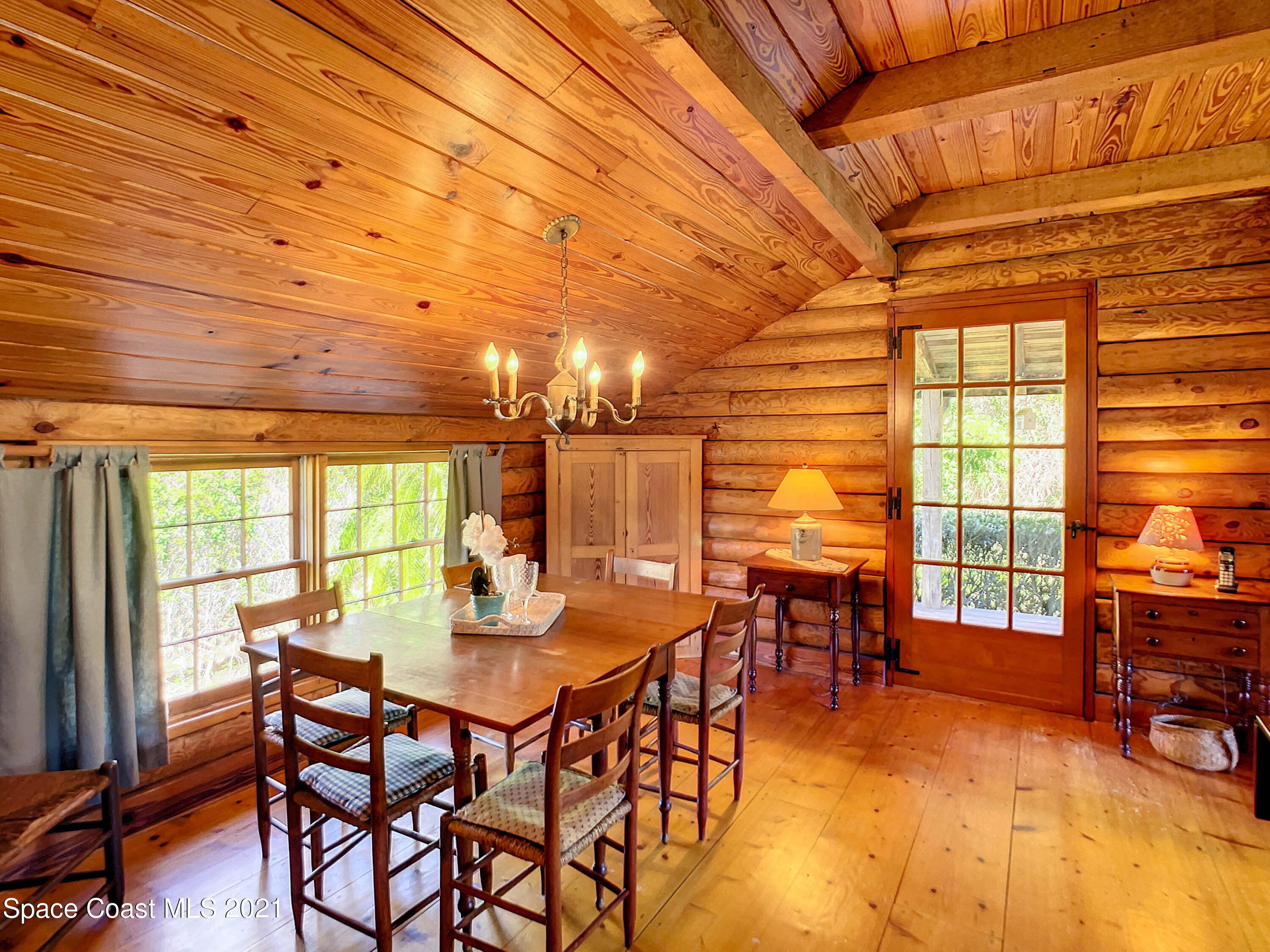 4340 Burkholm Road Mims, FL 32754 - Photo 9 of 39 Dining Towards Side Entry Door