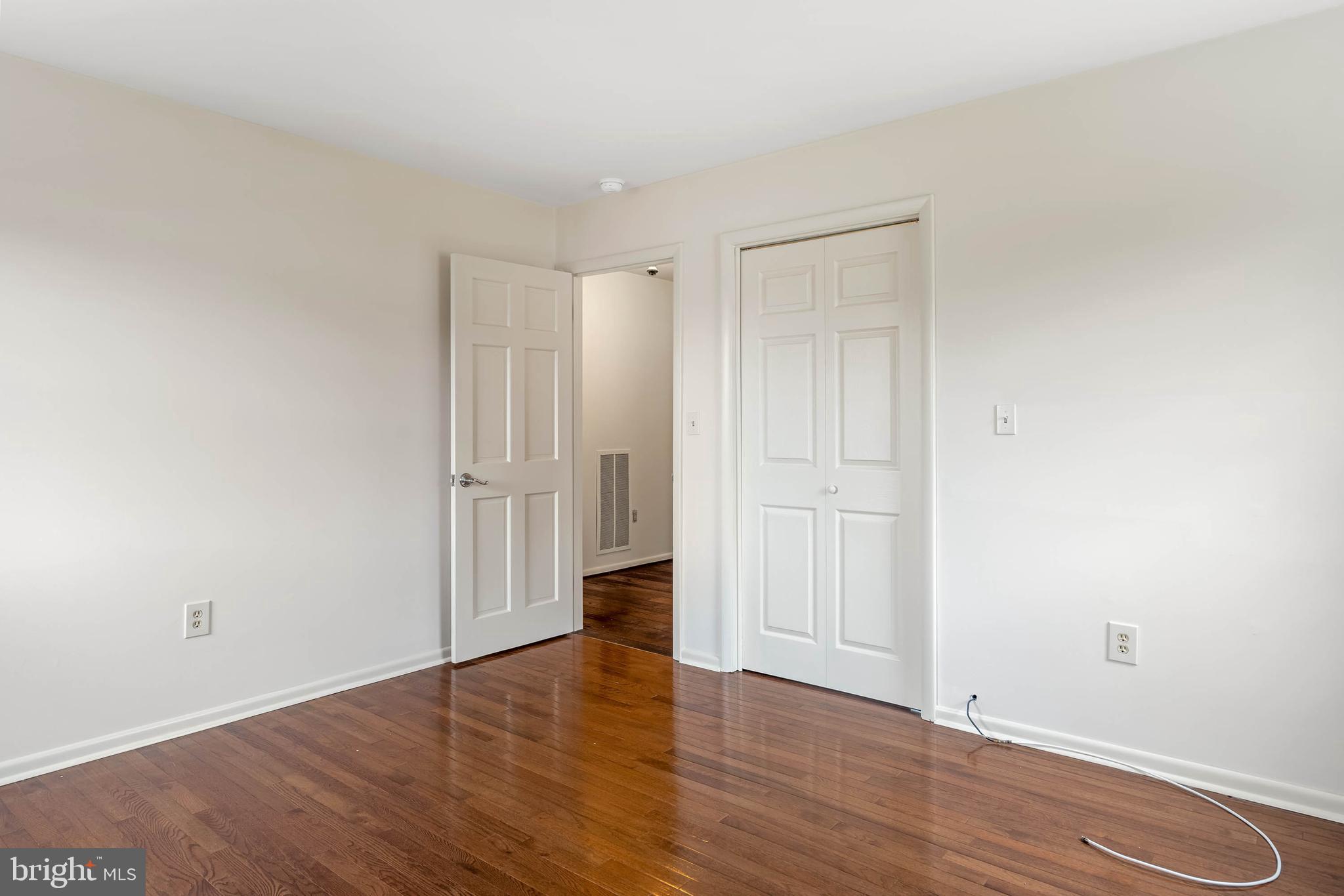 27 Devries Circle Lewes, DE 19958 - Photo 17 of 40 a view of an empty room and wooden floor