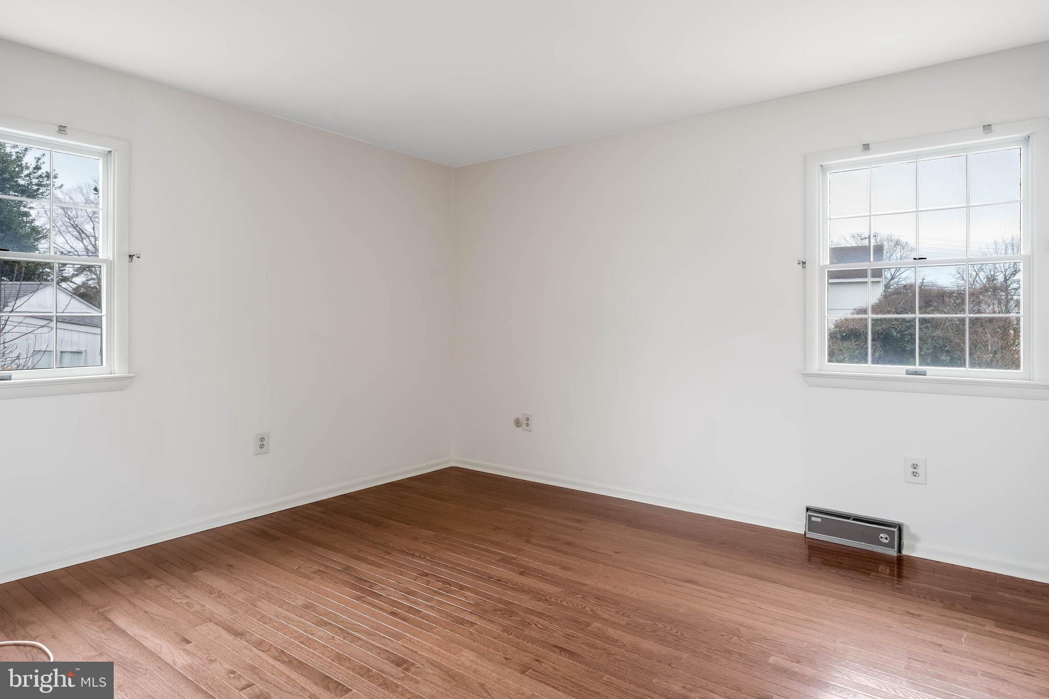 27 Devries Circle Lewes, DE 19958 - Photo 19 of 40 a view of a room with wooden floor and windows