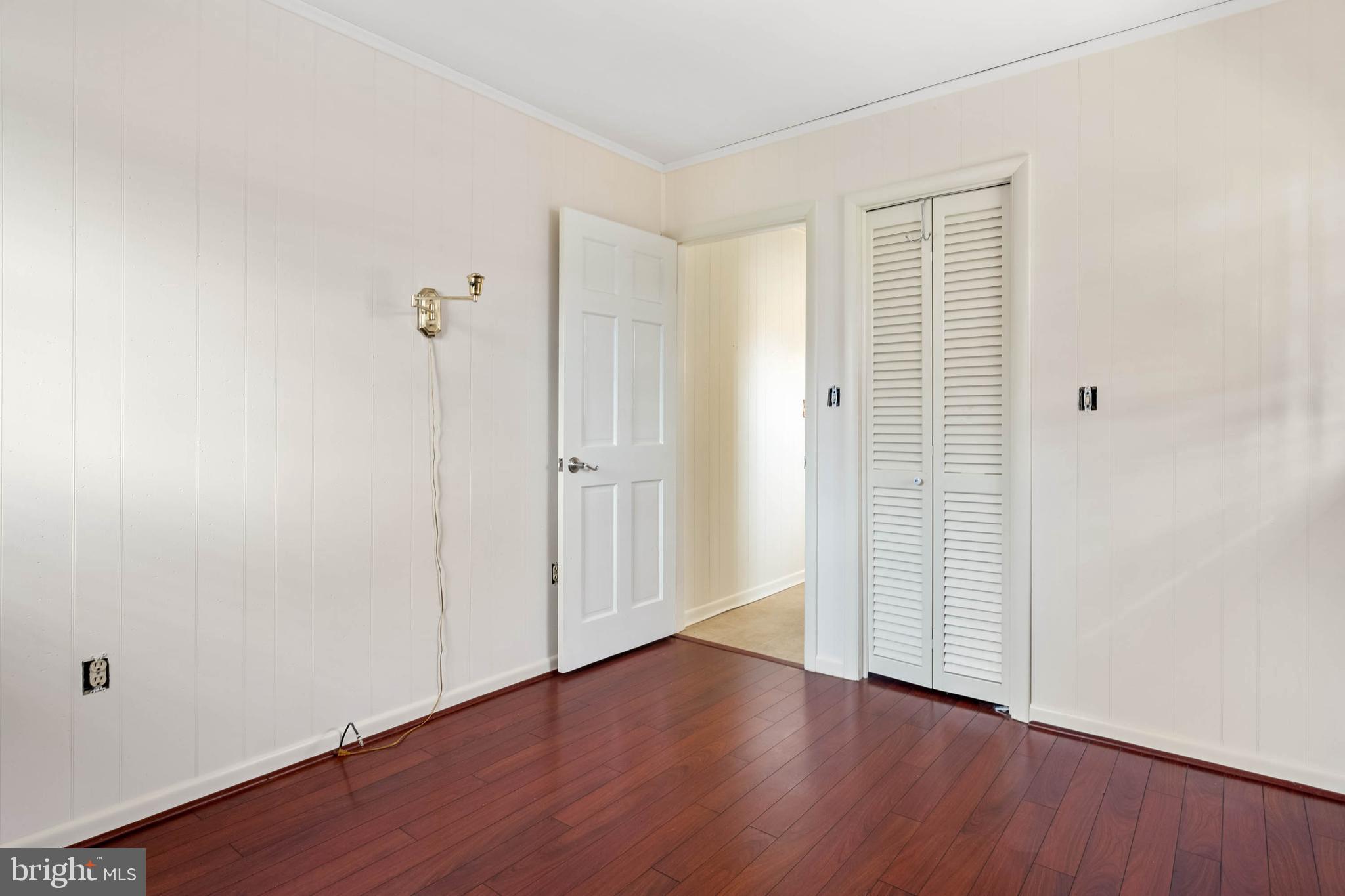 27 Devries Circle Lewes, DE 19958 - Photo 24 of 40 an empty room with wooden floor
