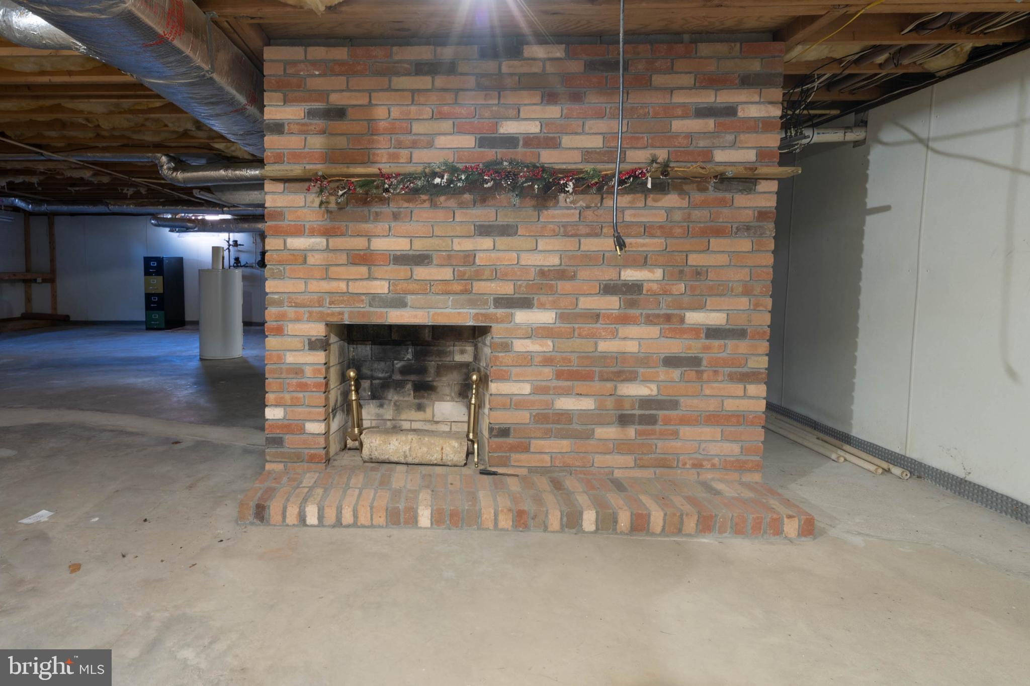 27 Devries Circle Lewes, DE 19958 - Photo 29 of 40 a living room with a fireplace