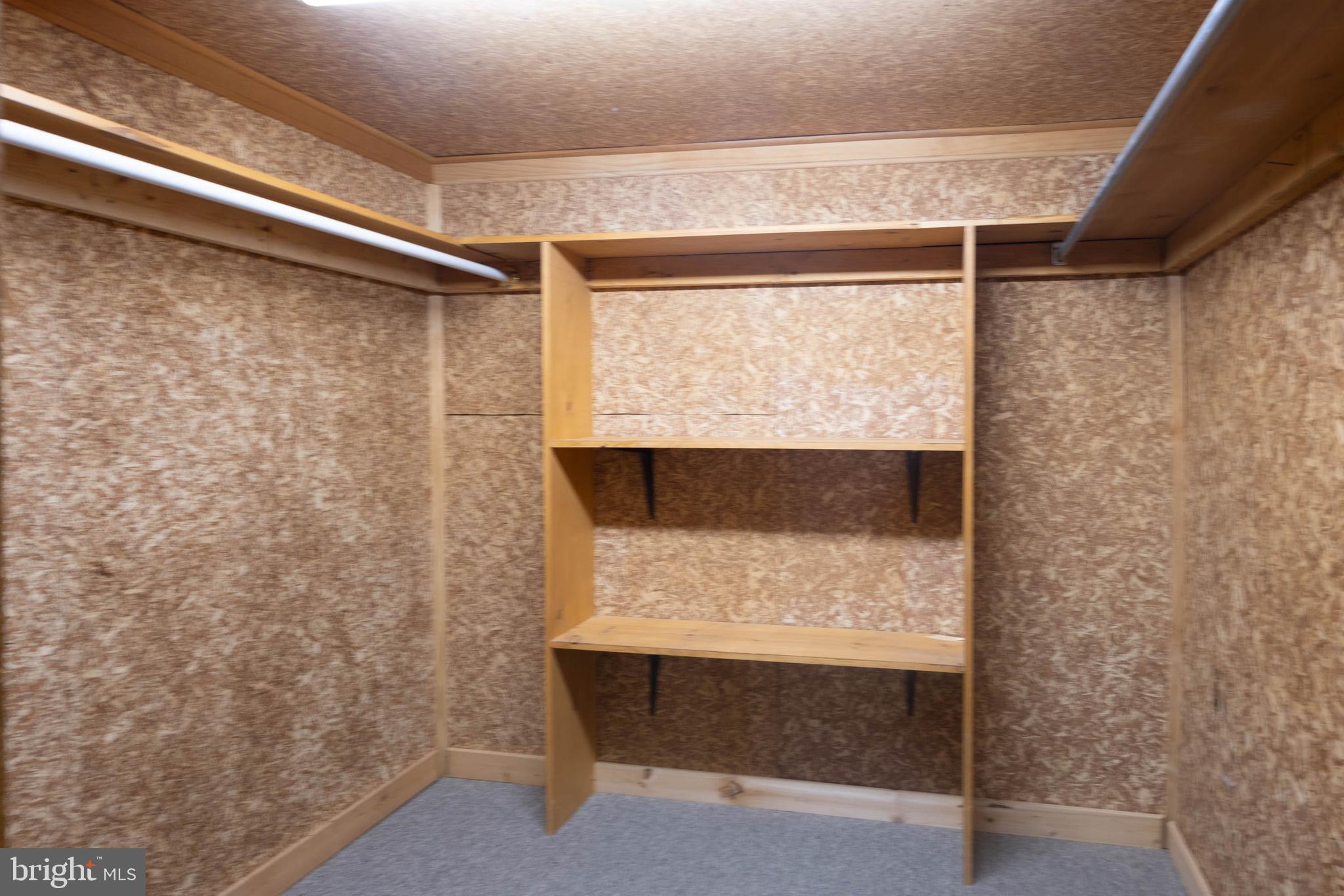 27 Devries Circle Lewes, DE 19958 - Photo 30 of 40 a room with a bench