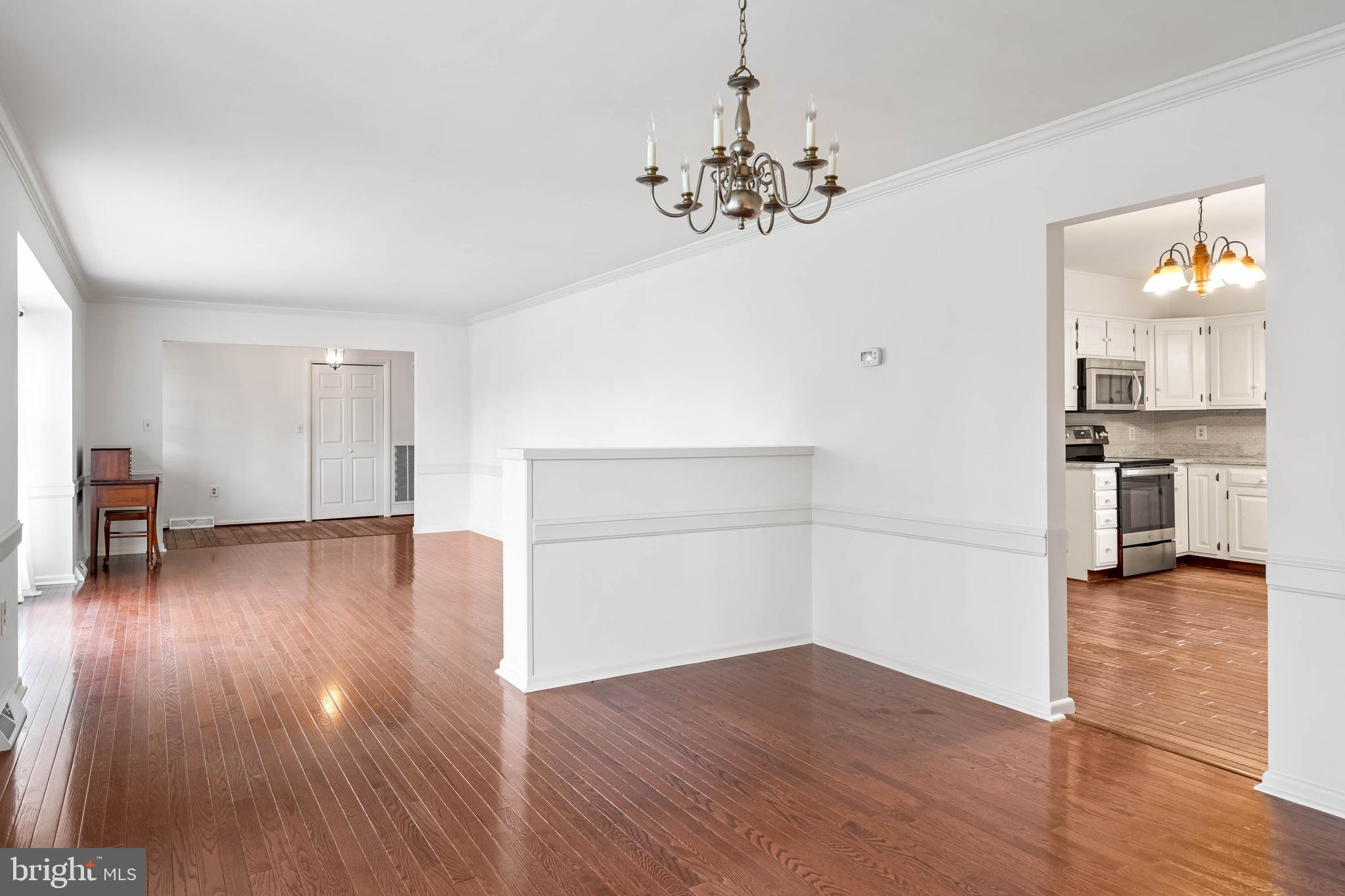 27 Devries Circle Lewes, DE 19958 - Photo 6 of 40 a view of livingroom with wooden floor