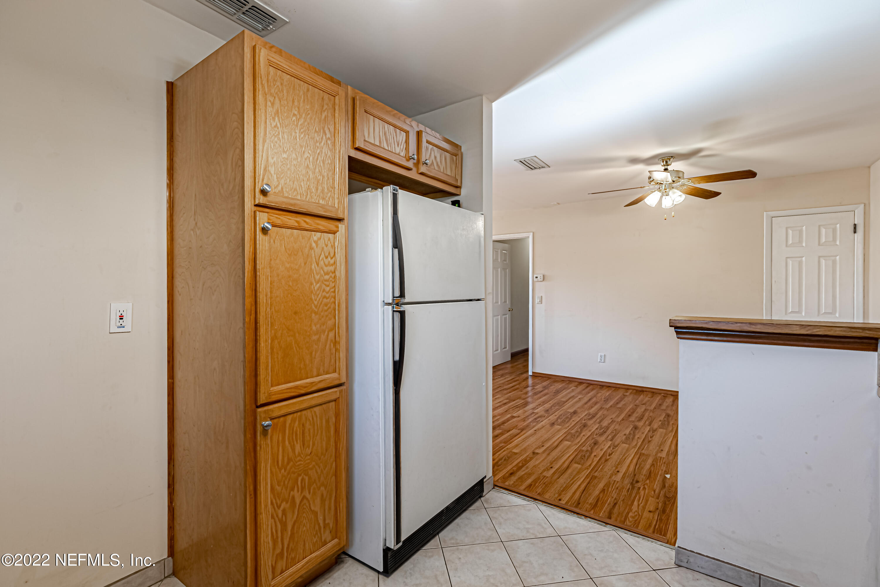 7204 Old Kings Road South Jacksonville, FL 32217 - Photo 14 of 32 a view of a refrigerator in kitchen and an empty room