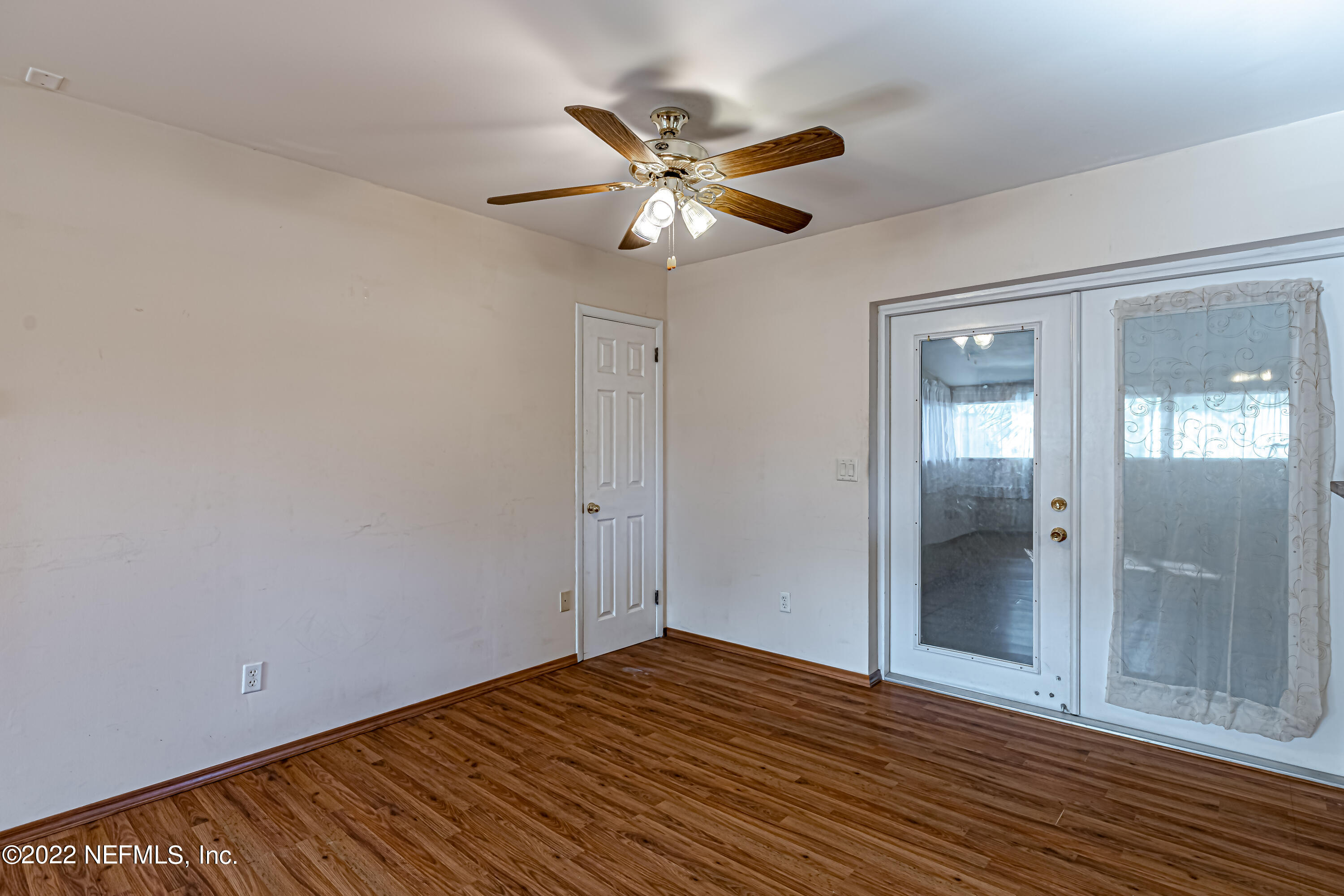 7204 Old Kings Road South Jacksonville, FL 32217 - Photo 16 of 32 a view of empty room with wooden floor