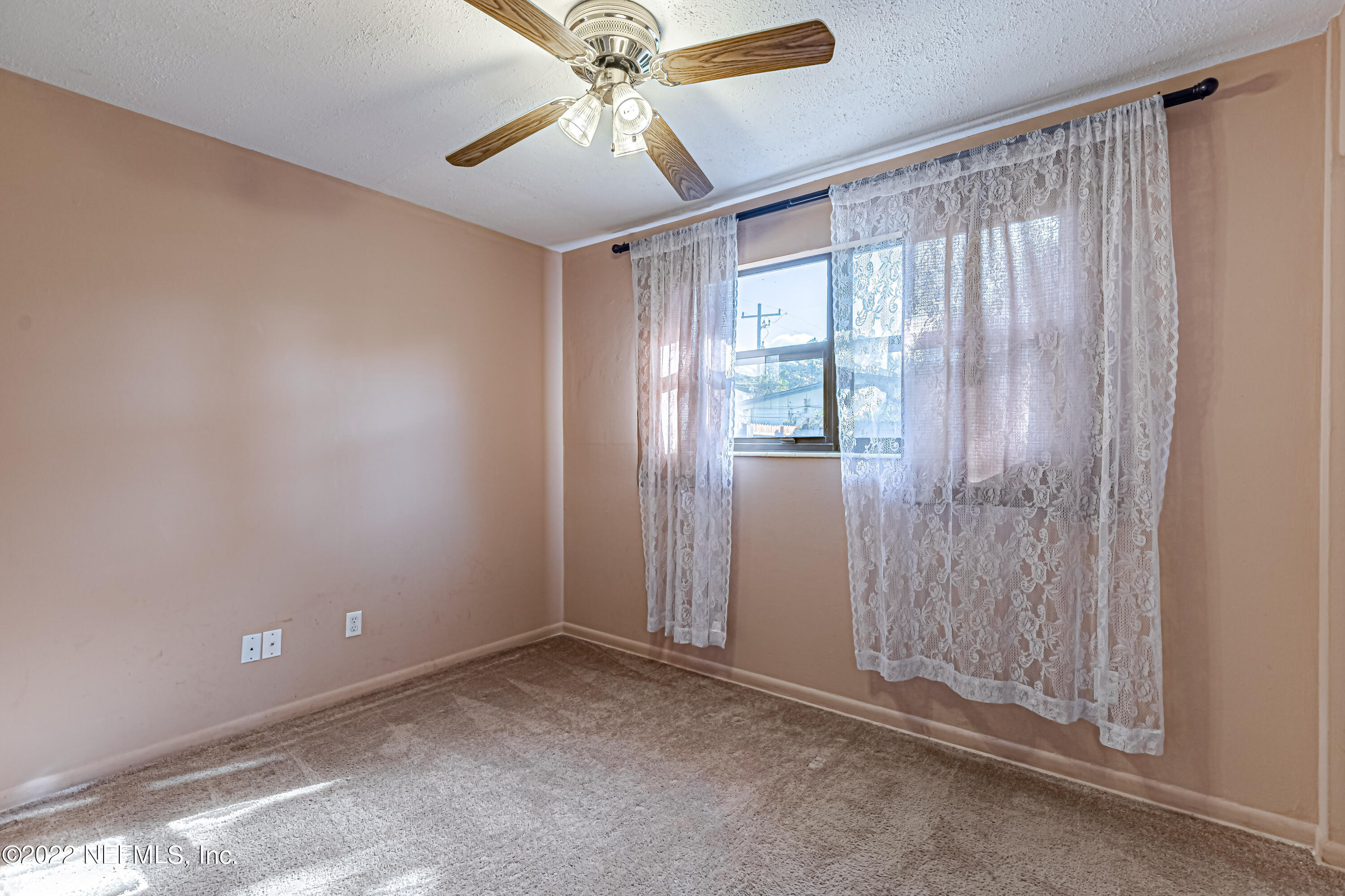 7204 Old Kings Road South Jacksonville, FL 32217 - Photo 18 of 32 a view of an empty room with a window