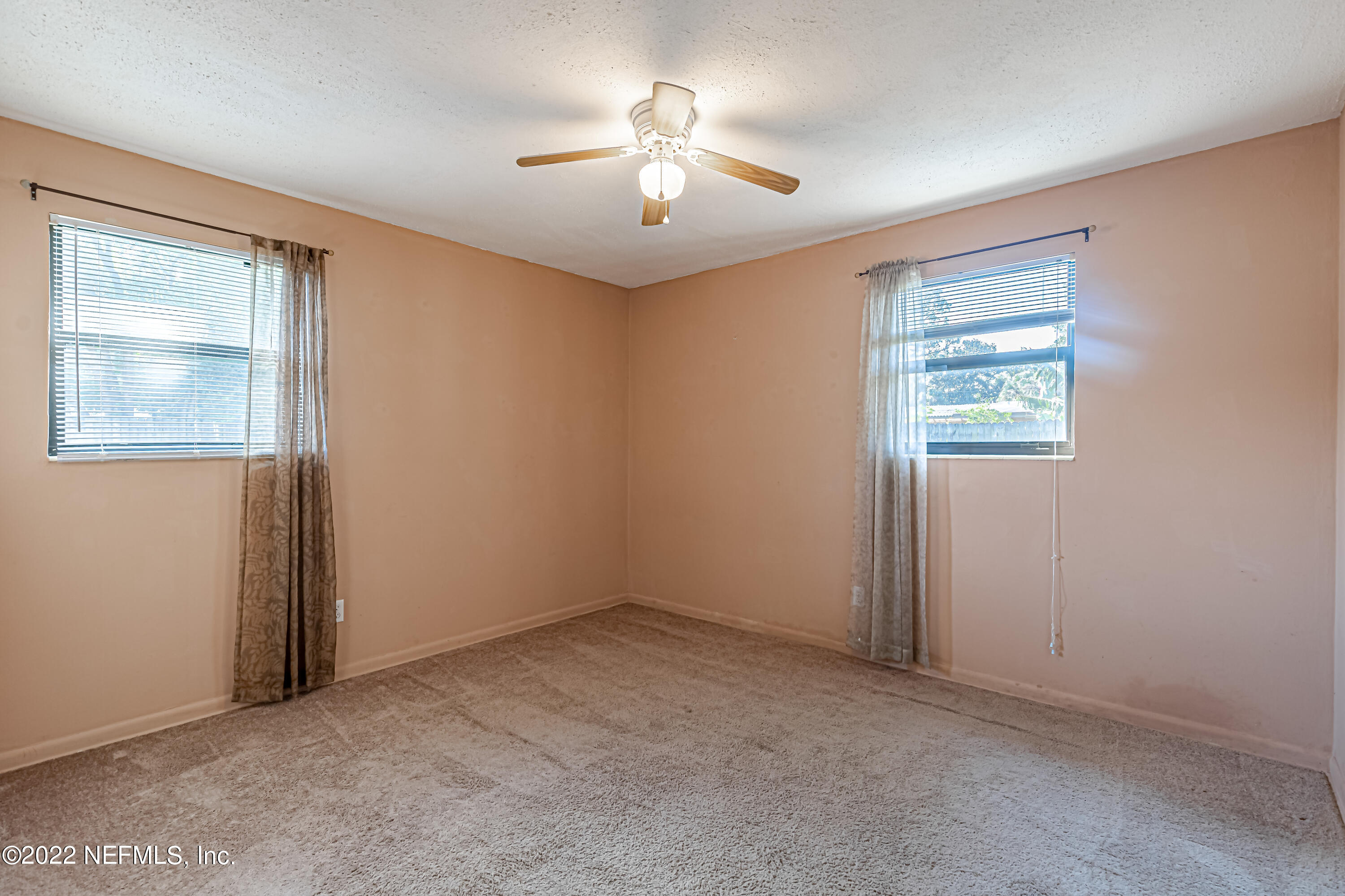 7204 Old Kings Road South Jacksonville, FL 32217 - Photo 19 of 32 an empty room with windows and closet