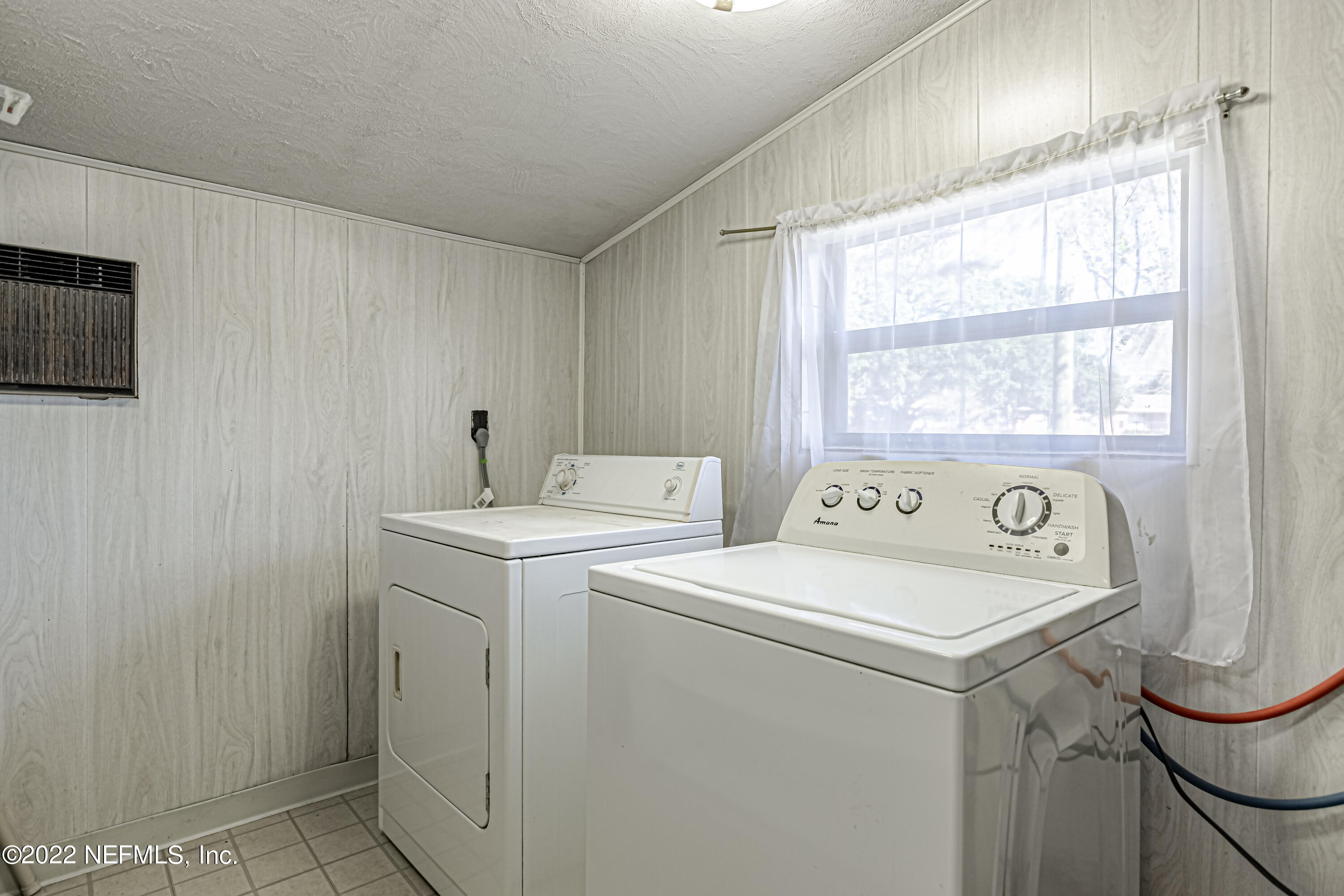 7204 Old Kings Road South Jacksonville, FL 32217 - Photo 26 of 32 a utility room with dryer and washer