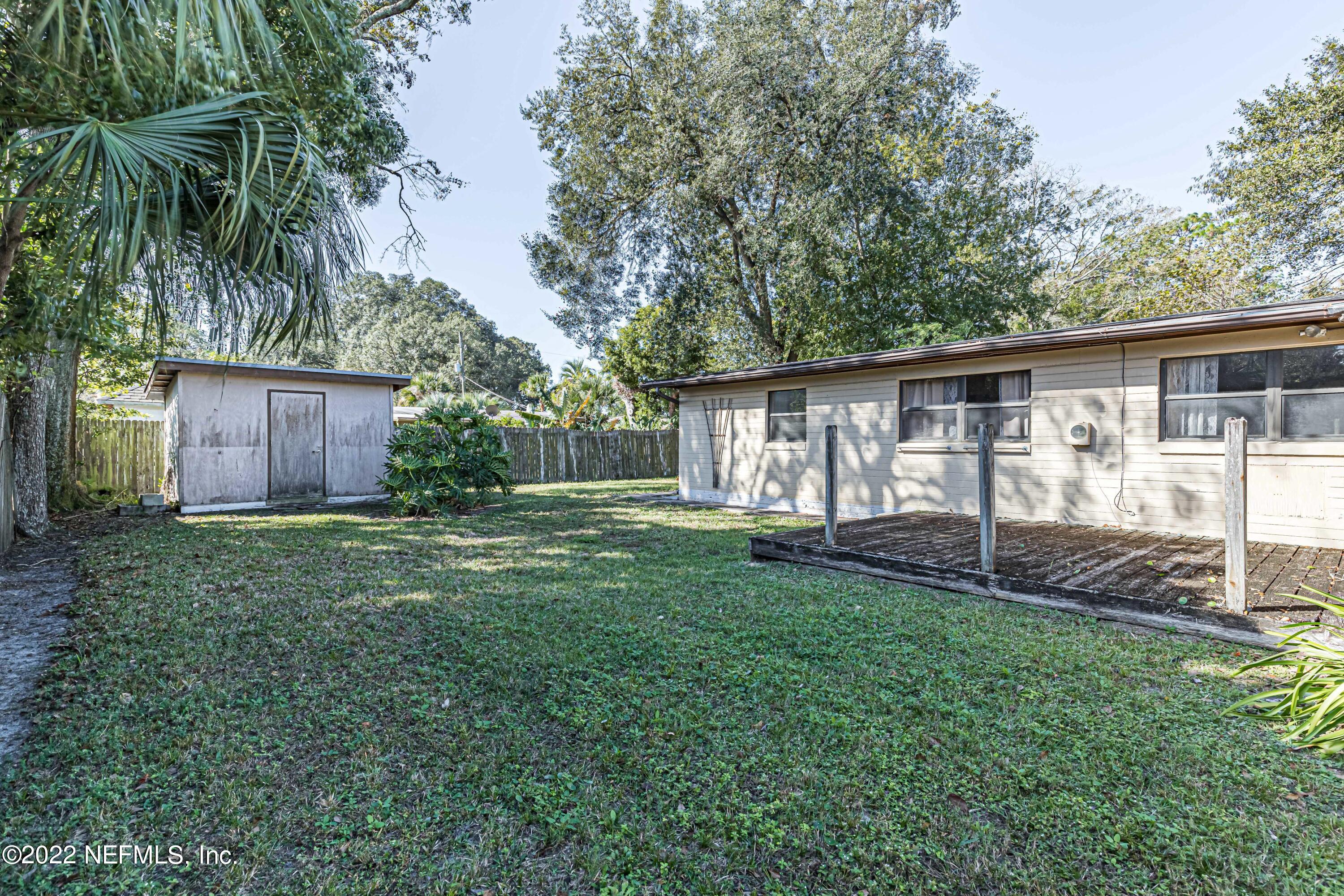 7204 Old Kings Road South Jacksonville, FL 32217 - Photo 30 of 32 a view of a house with yard and a garden