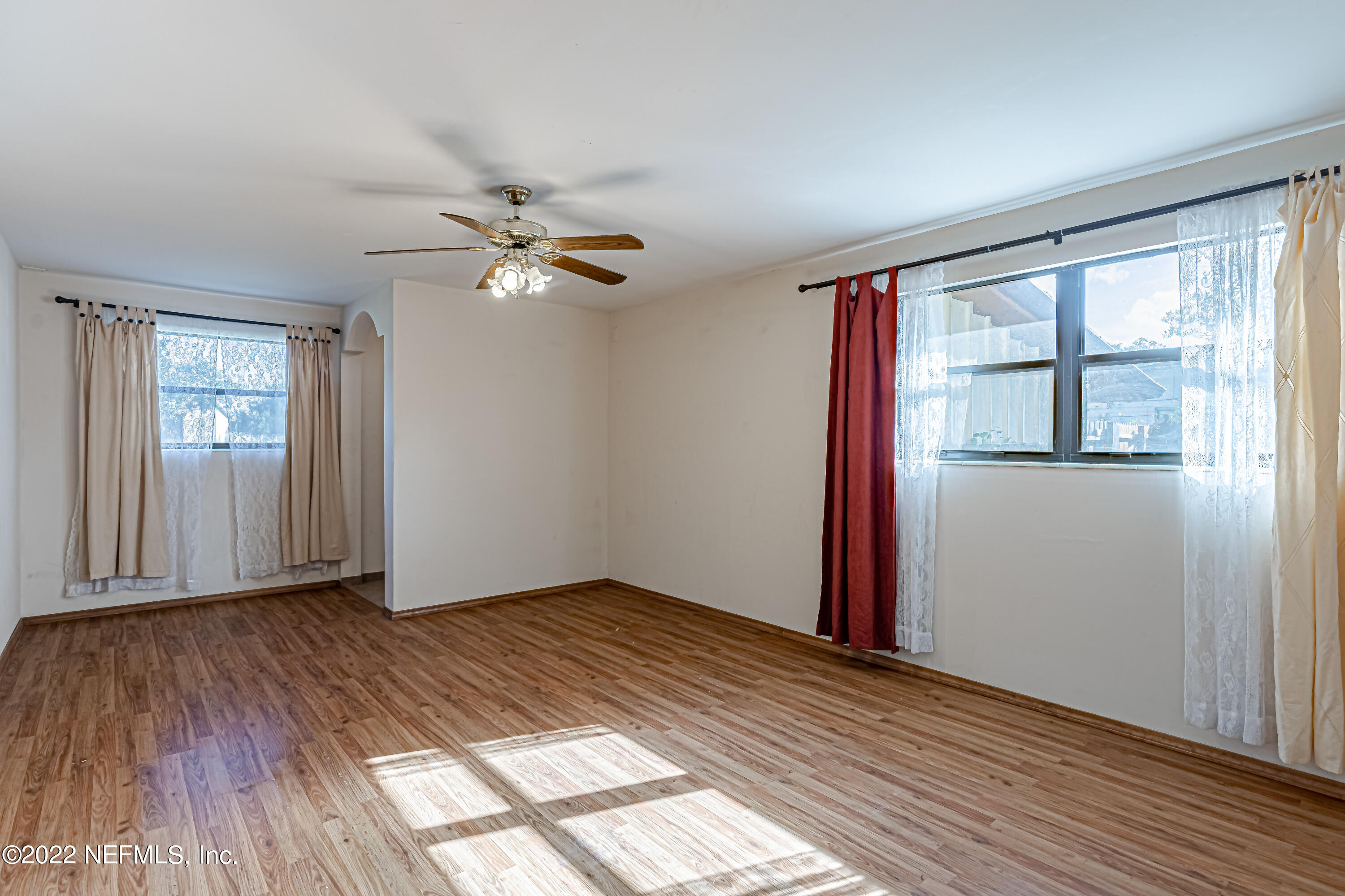 7204 Old Kings Road South Jacksonville, FL 32217 - Photo 9 of 32 wooden floor in an empty room with a window