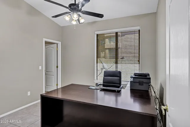 a view of a workspace with furniture