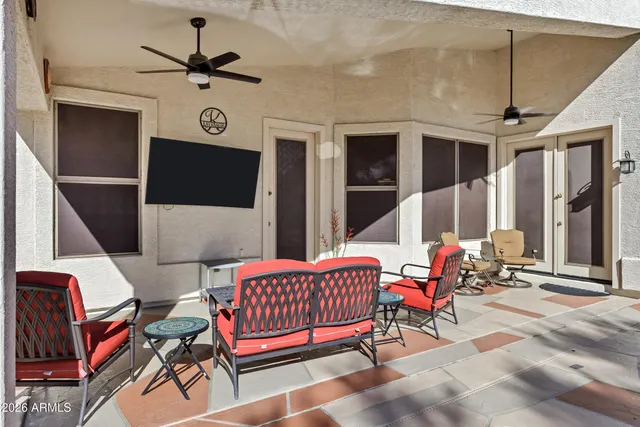 a outdoor space with patio the couch and a potted plant