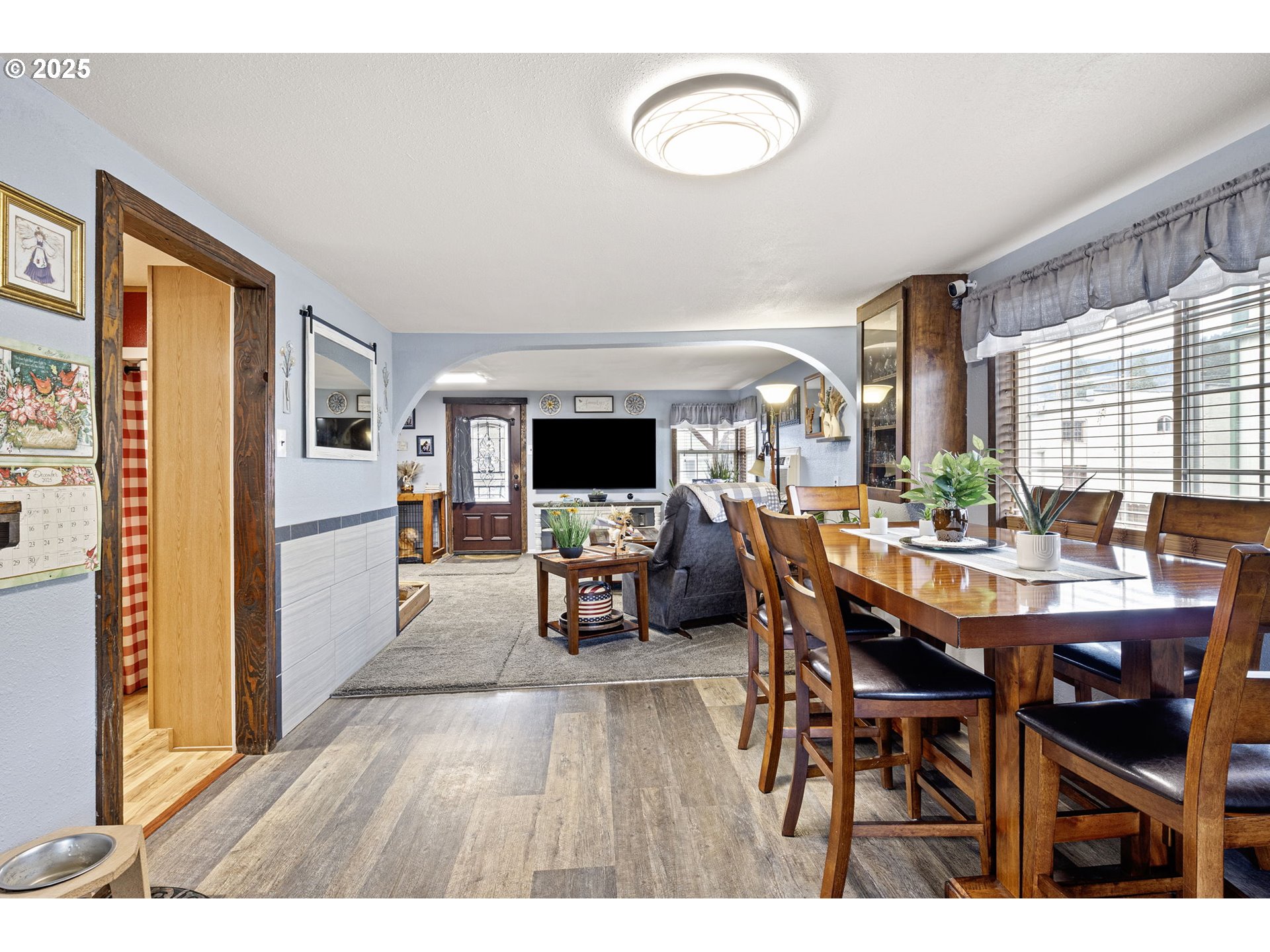 252 Alder Street Yoncalla, OR 97499 - Photo 18 of 47 a view of a dining room with furniture and a large window