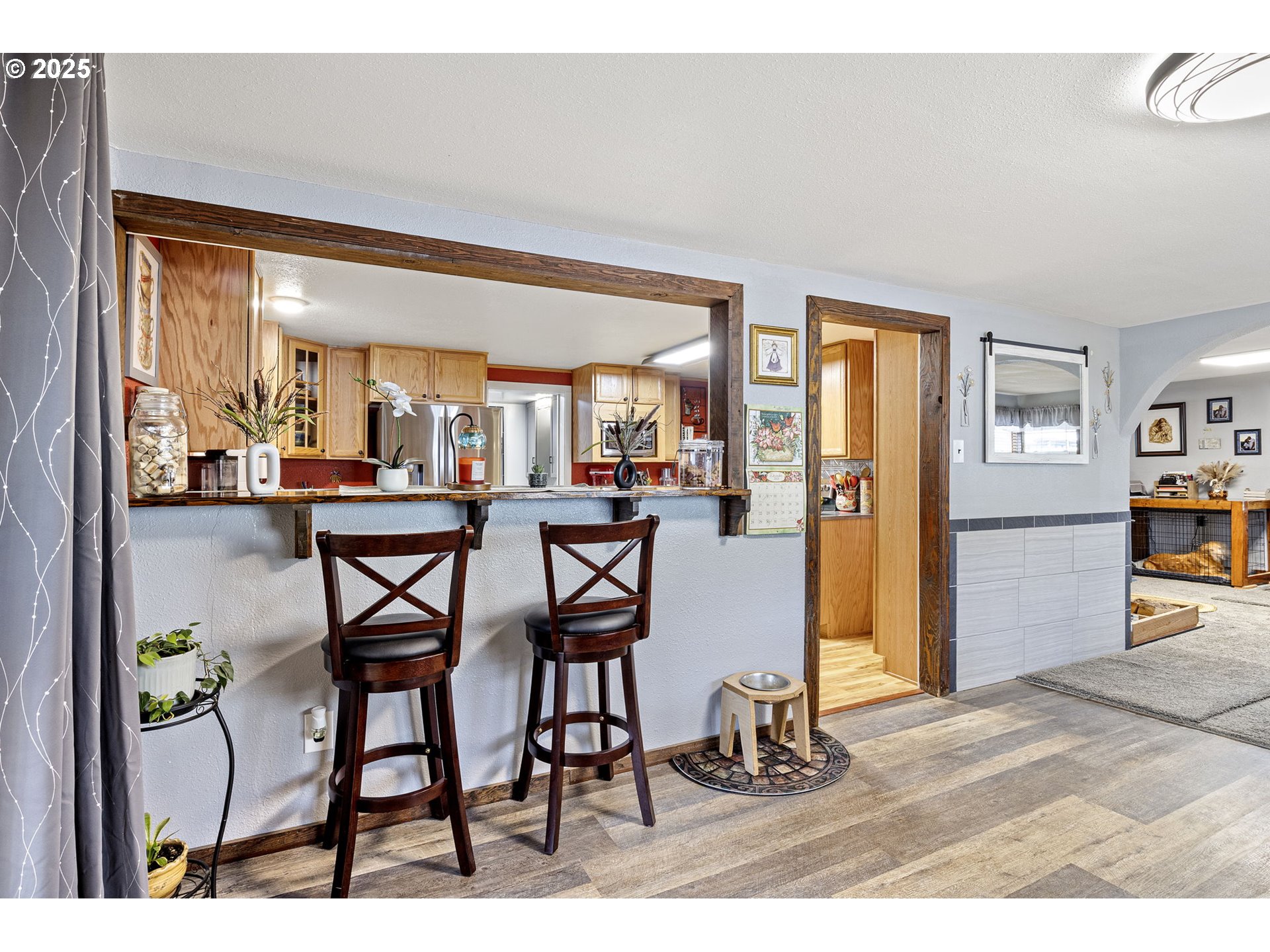 252 Alder Street Yoncalla, OR 97499 - Photo 19 of 47 a dining room with furniture and a kitchen view