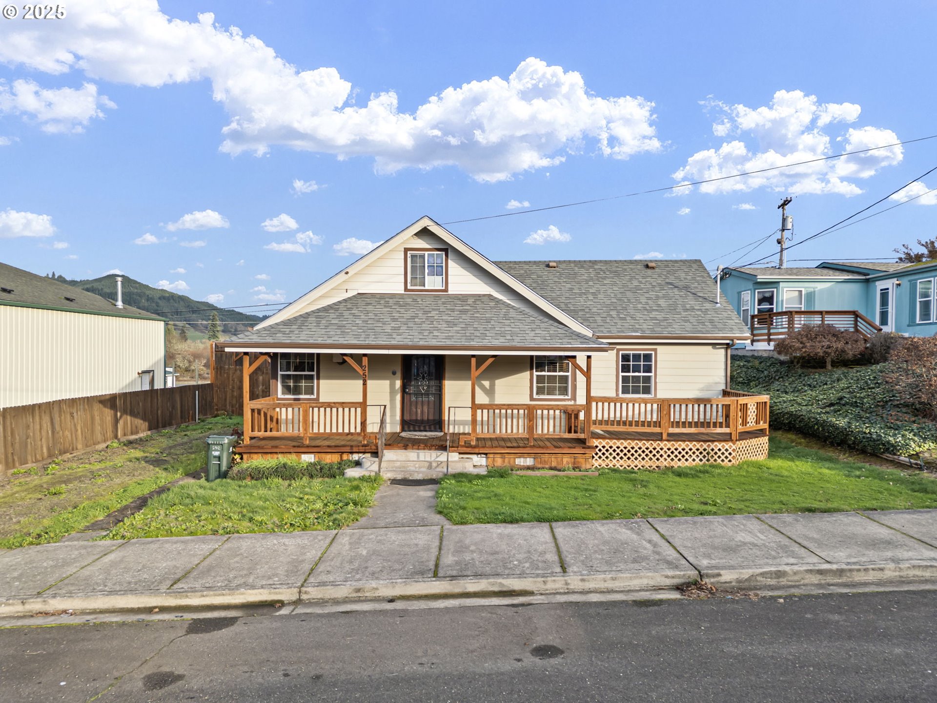 252 Alder Street Yoncalla, OR 97499 - Photo 2 of 47 front view of a house with a yard