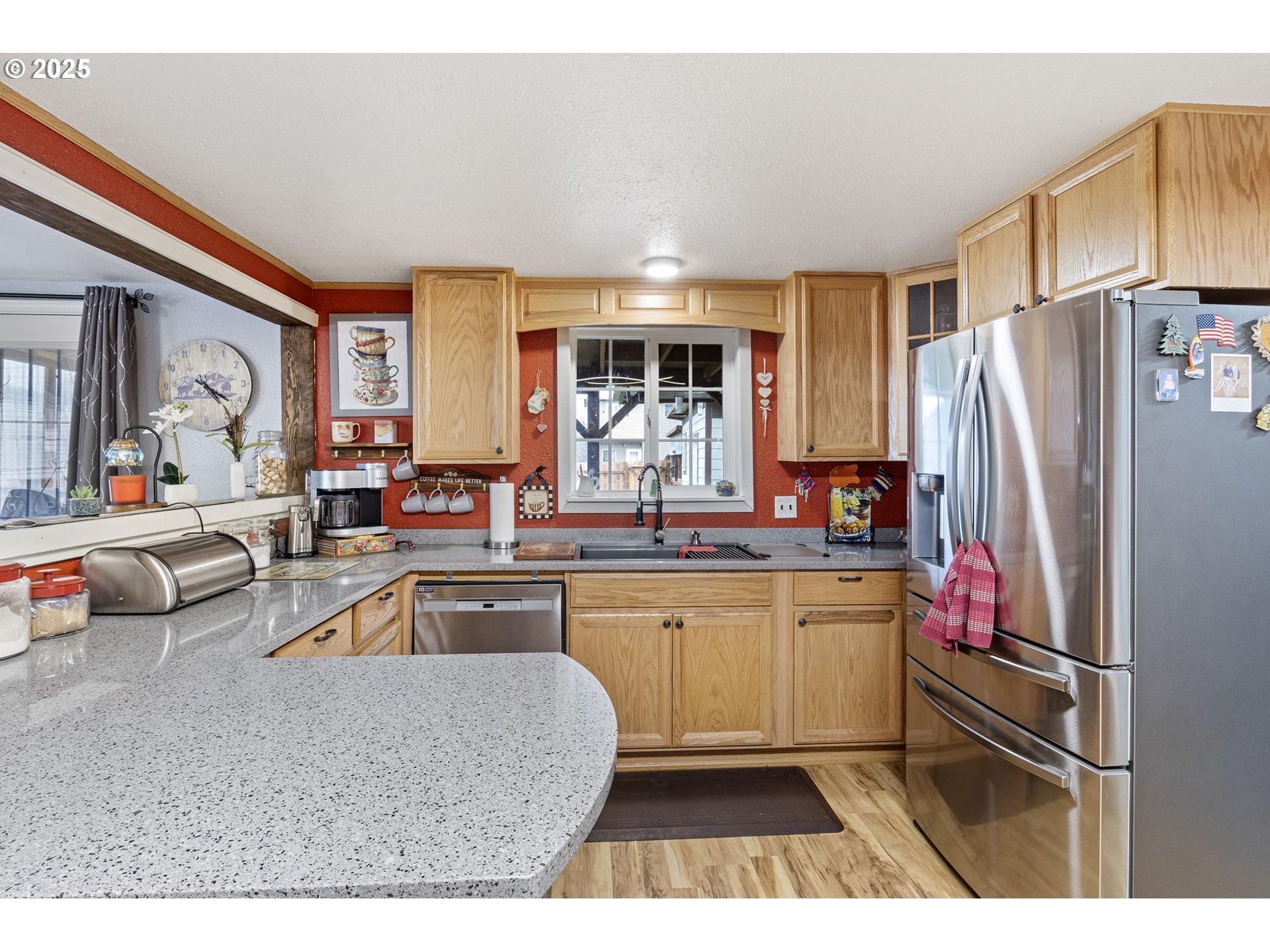 252 Alder Street Yoncalla, OR 97499 - Photo 22 of 47 a kitchen with cabinets a sink and stainless steel appliances