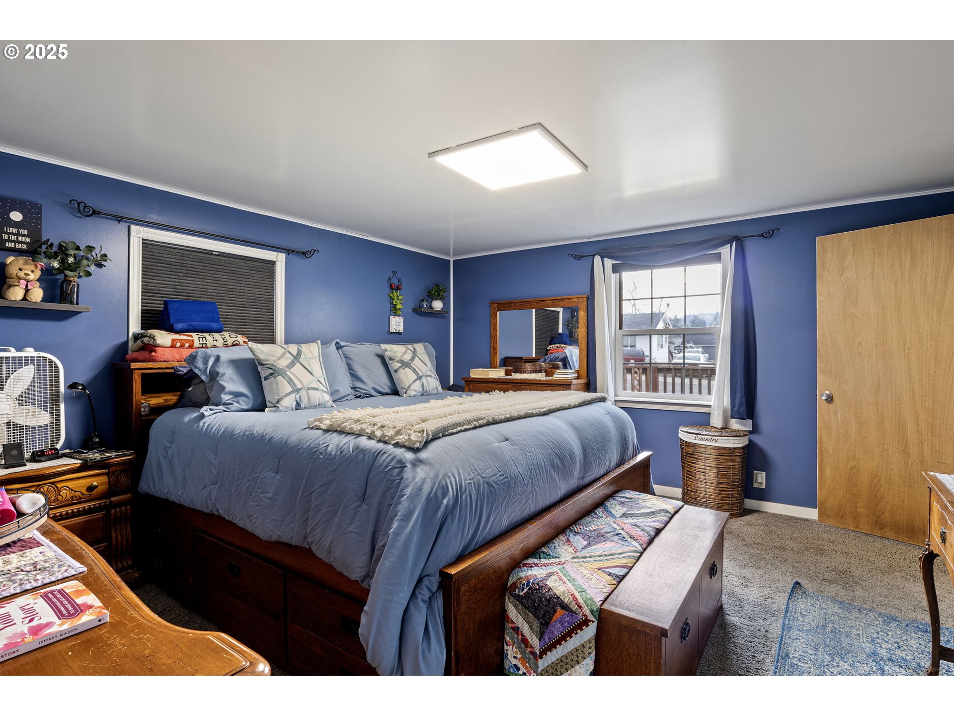 252 Alder Street Yoncalla, OR 97499 - Photo 28 of 47 a bedroom with a large bed and a window