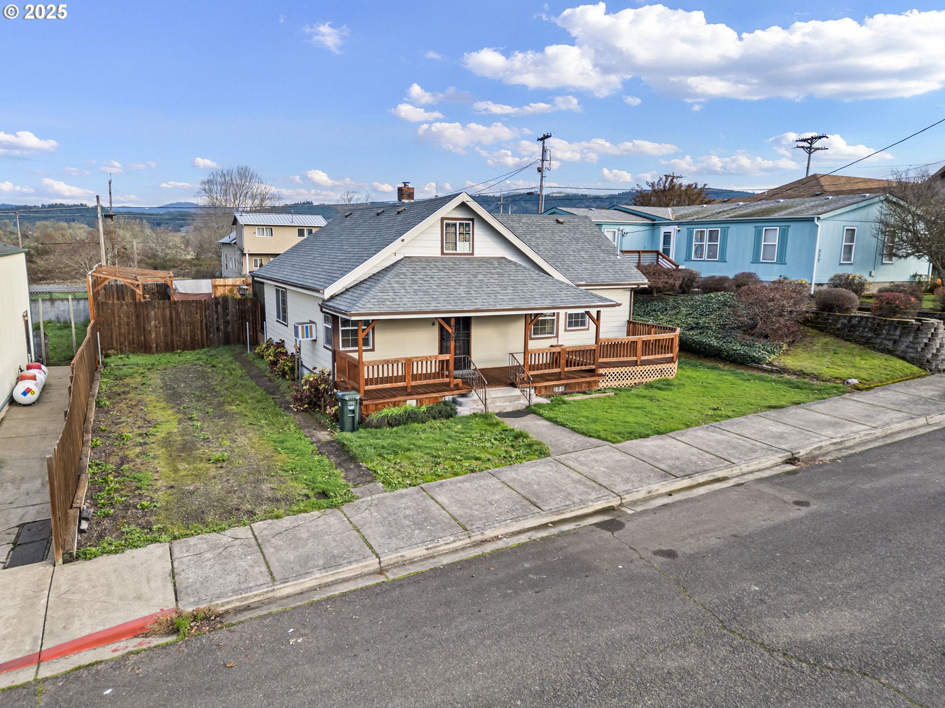 252 Alder Street Yoncalla, OR 97499 - Photo 4 of 47 a house view with a garden space