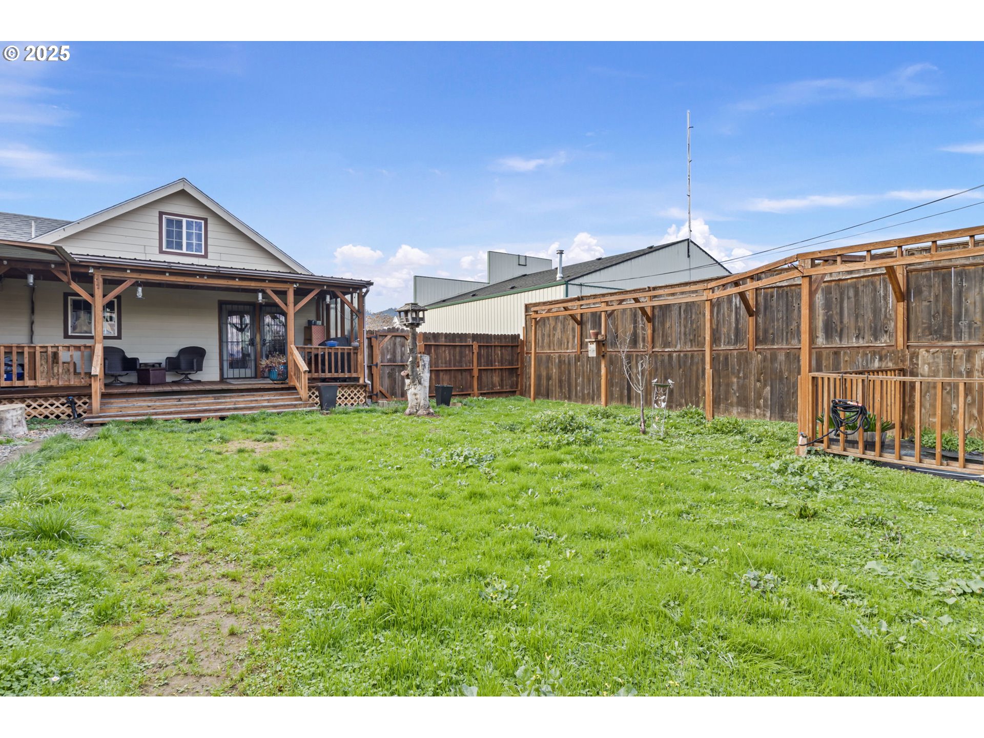 252 Alder Street Yoncalla, OR 97499 - Photo 43 of 47 a view of a house with a yard porch and sitting area