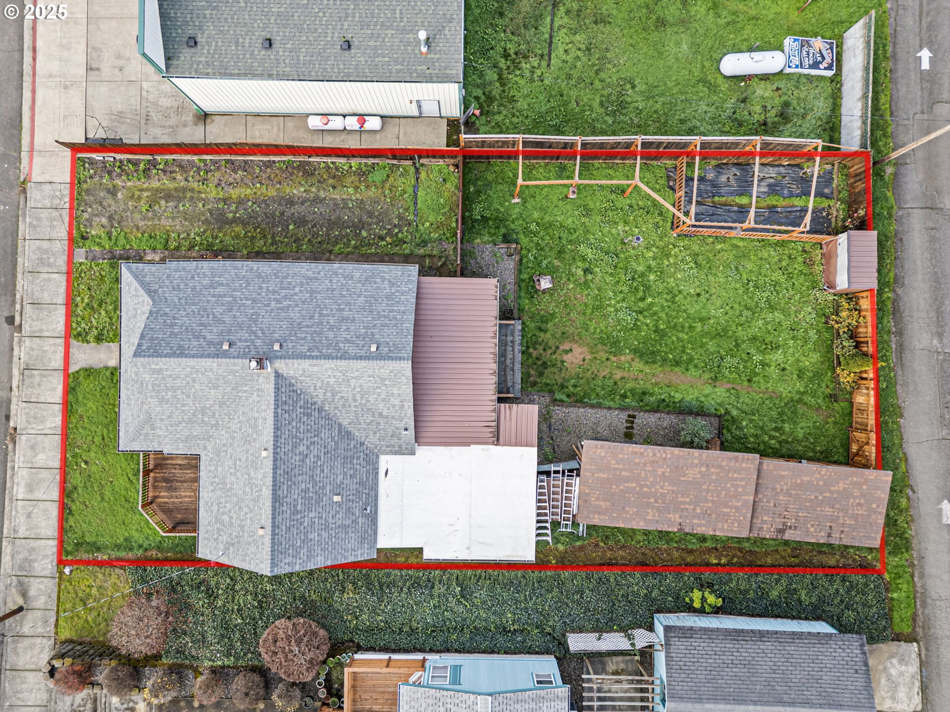 252 Alder Street Yoncalla, OR 97499 - Photo 45 of 47 aerial view of a house with a yard and potted plants