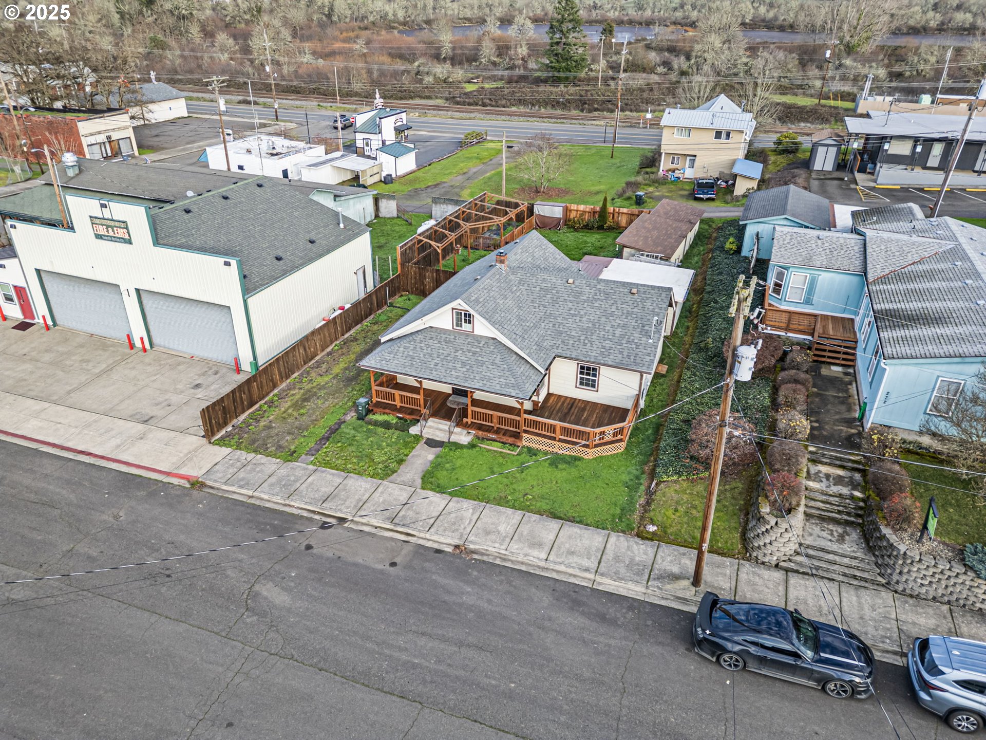 252 Alder Street Yoncalla, OR 97499 - Photo 7 of 47 an aerial view of a house with a yard and lake view