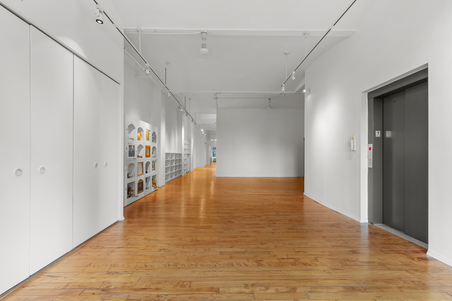 712 Broadway, Unit 7 Manhattan, NY 10003 - Photo 5 of 14 a view of empty room with wooden floor